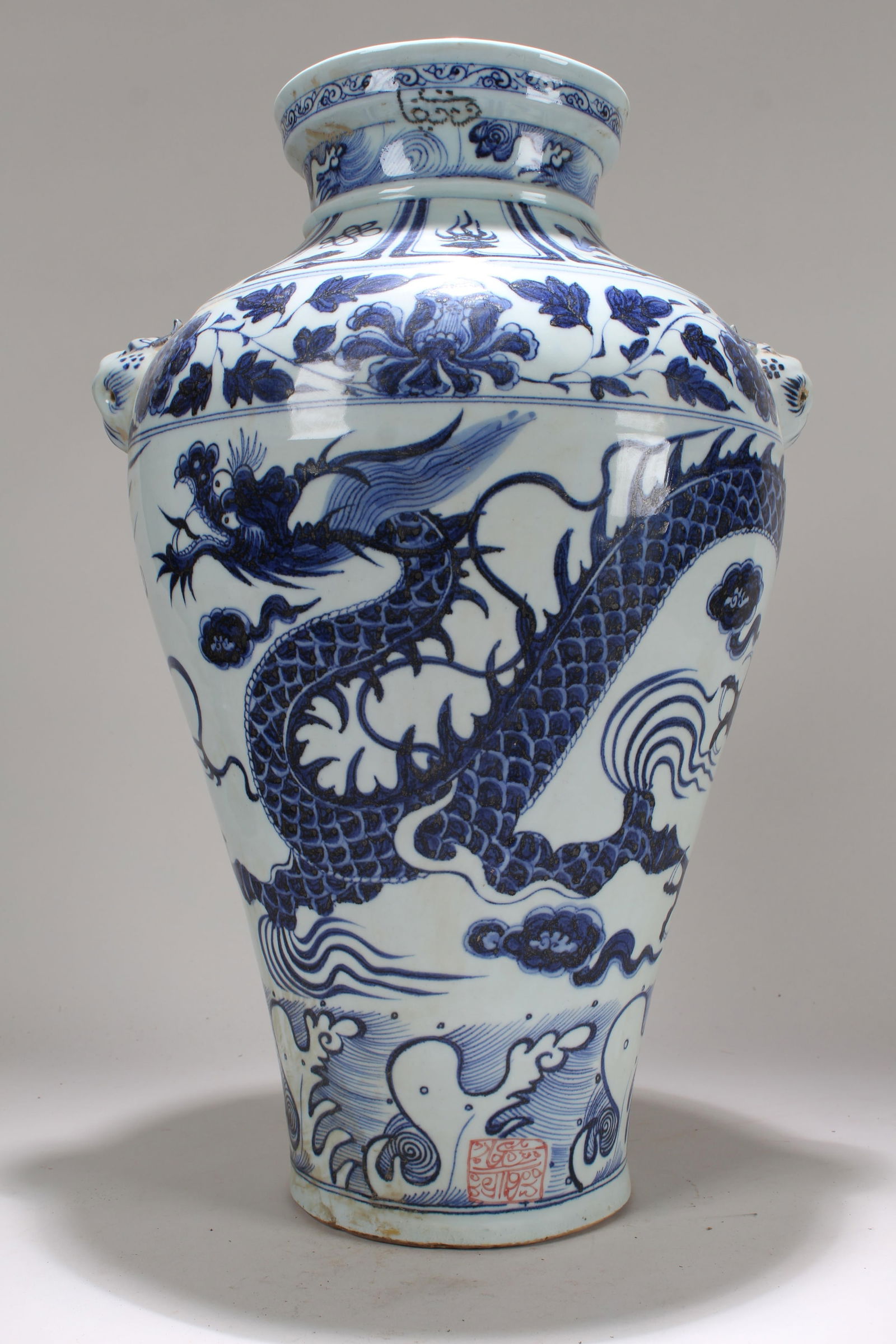 A Chinese Duo-handled Blue and White Dragon-decorating Porcelain Vase: A Chinese Duo-handled Blue and White Dragon-decorating Porcelain Vase . Height: 17.25 (inch).
