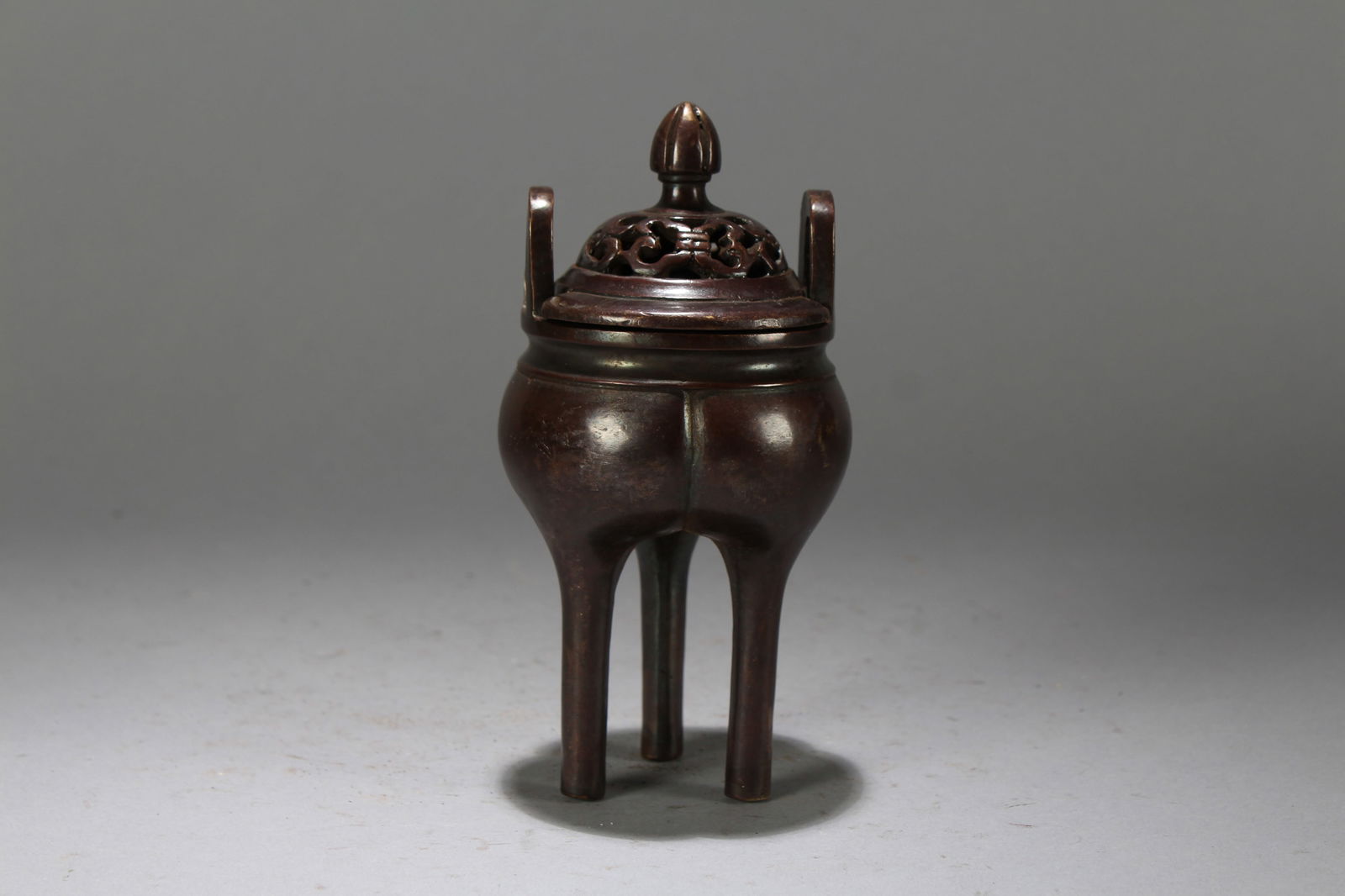 A Chinese Vividly-detailed Tri-podded Fortune Censer (1 of 6)