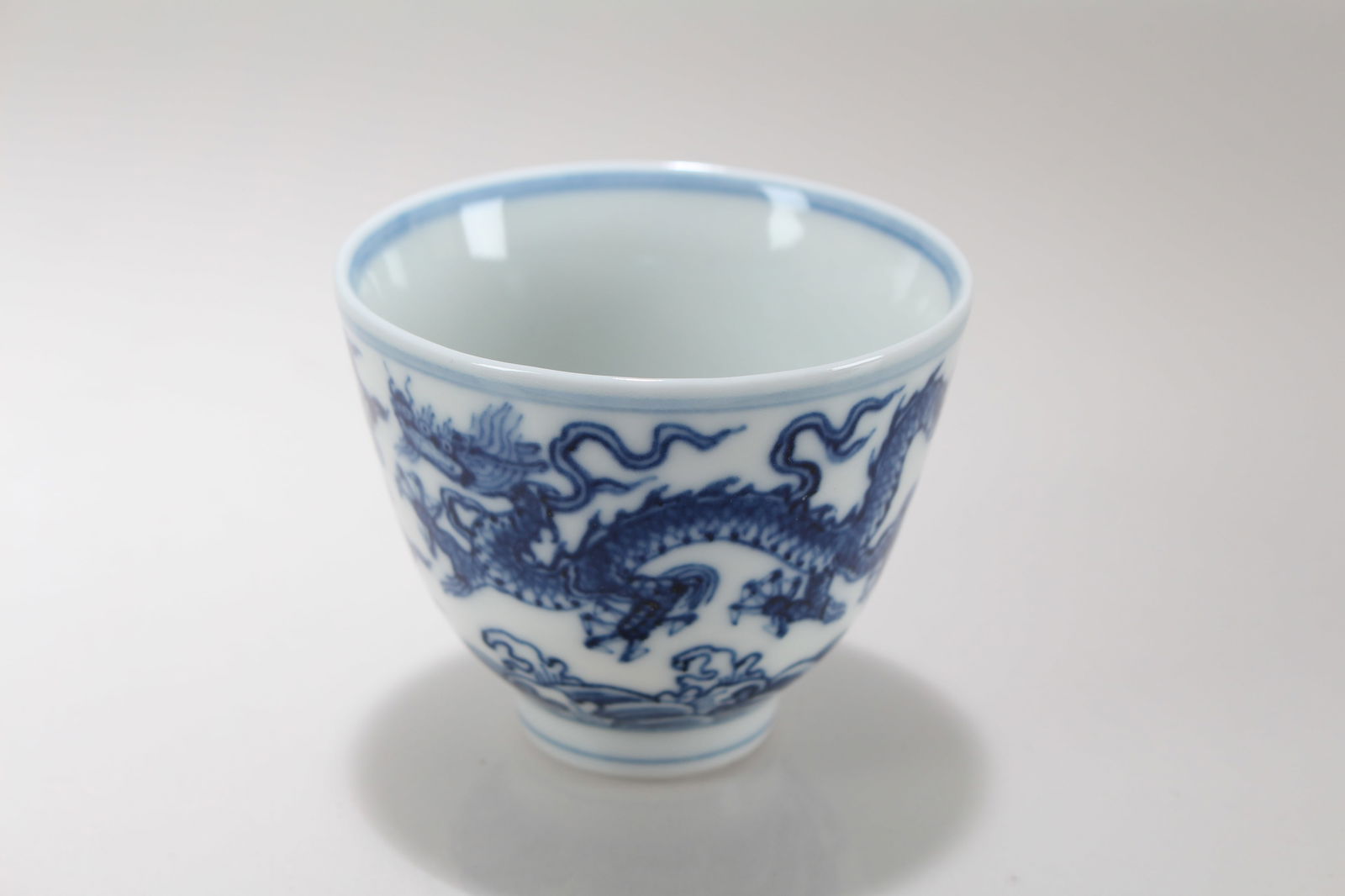 A Chinese Blue and White Dragon-decorating Porcelain Cup (1 of 4)