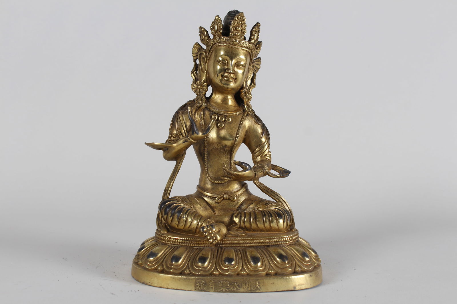 A Chinese Lotus-seated Fortune Gilt Buddha Statue: A Chinese Lotus-seated Fortune Gilt Buddha Statue . Height: 7.75 (inch).
