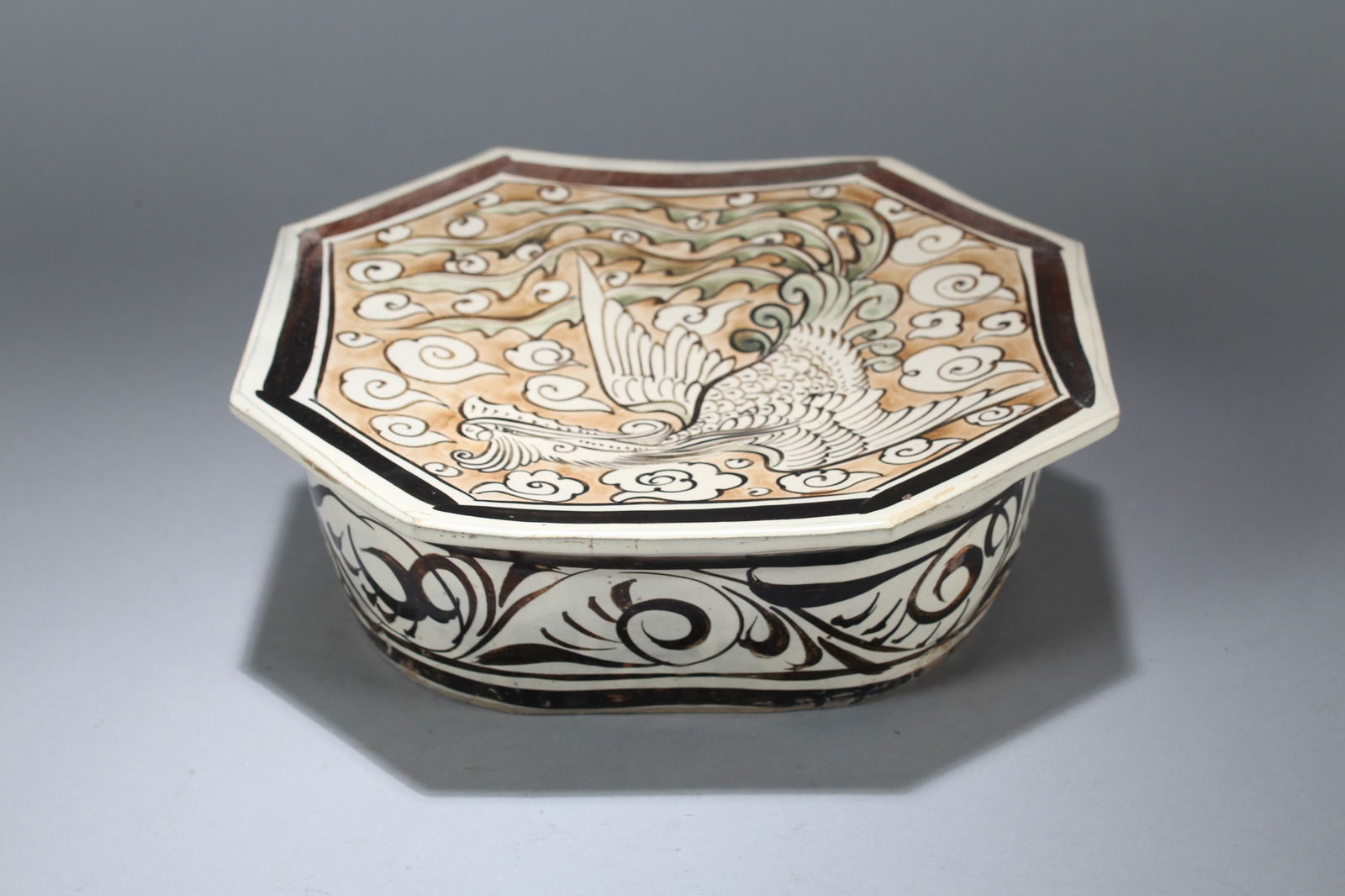 A Chinese Religious Phoenix-decorating Porcelain Fortune Statue: A Chinese Religious Phoenix-decorating Porcelain Fortune Statue. Height: 3.25 (inch). Width: 10 (inch). Length: 9 (inch).