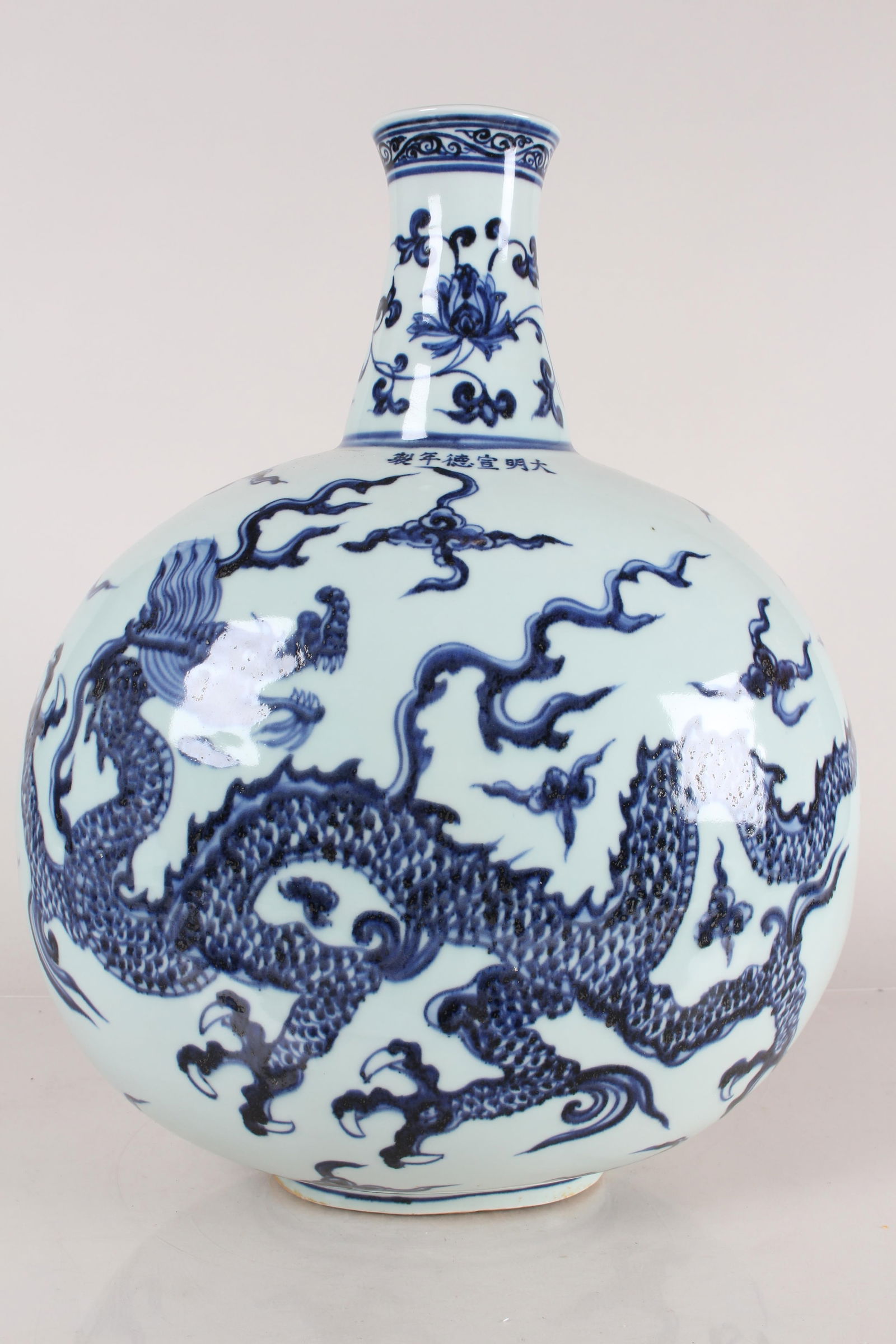A Chinese Blue and White Massive Dragon-decorating Porcelain Fortune Vase: A Chinese Blue and White Massive Dragon-decorating Porcelain Fortune Vase . Height: 11 (inch).