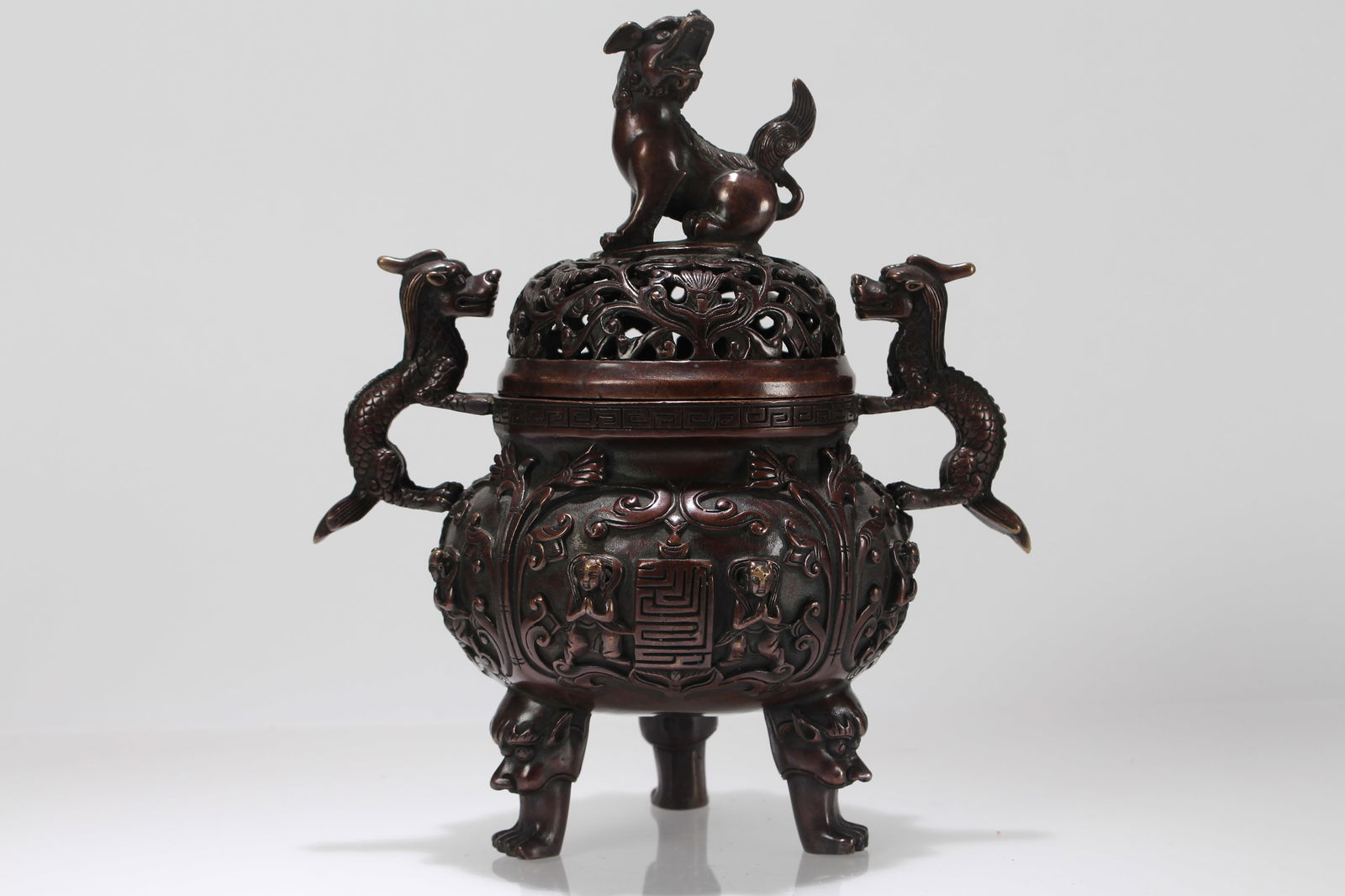 A Chinese Duo-handling Myth-beast Tri-podded Lidded Fortune Censer: A Chinese Duo-handling Myth-beast Tri-podded Lidded Fortune Censer. Height: 9 (inch).