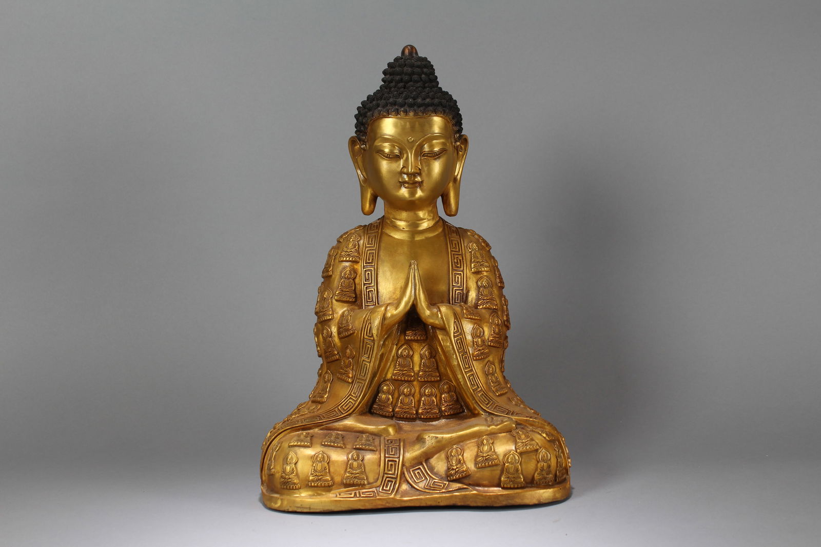A Chinese Pondering-pose Gilt Fortune Buddha Statue (1 of 7)