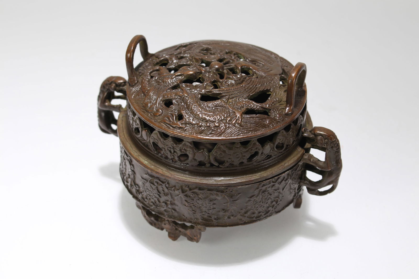 A Chinese Duo-handling Tri-podded Lidded Fortune Censer (1 of 4)