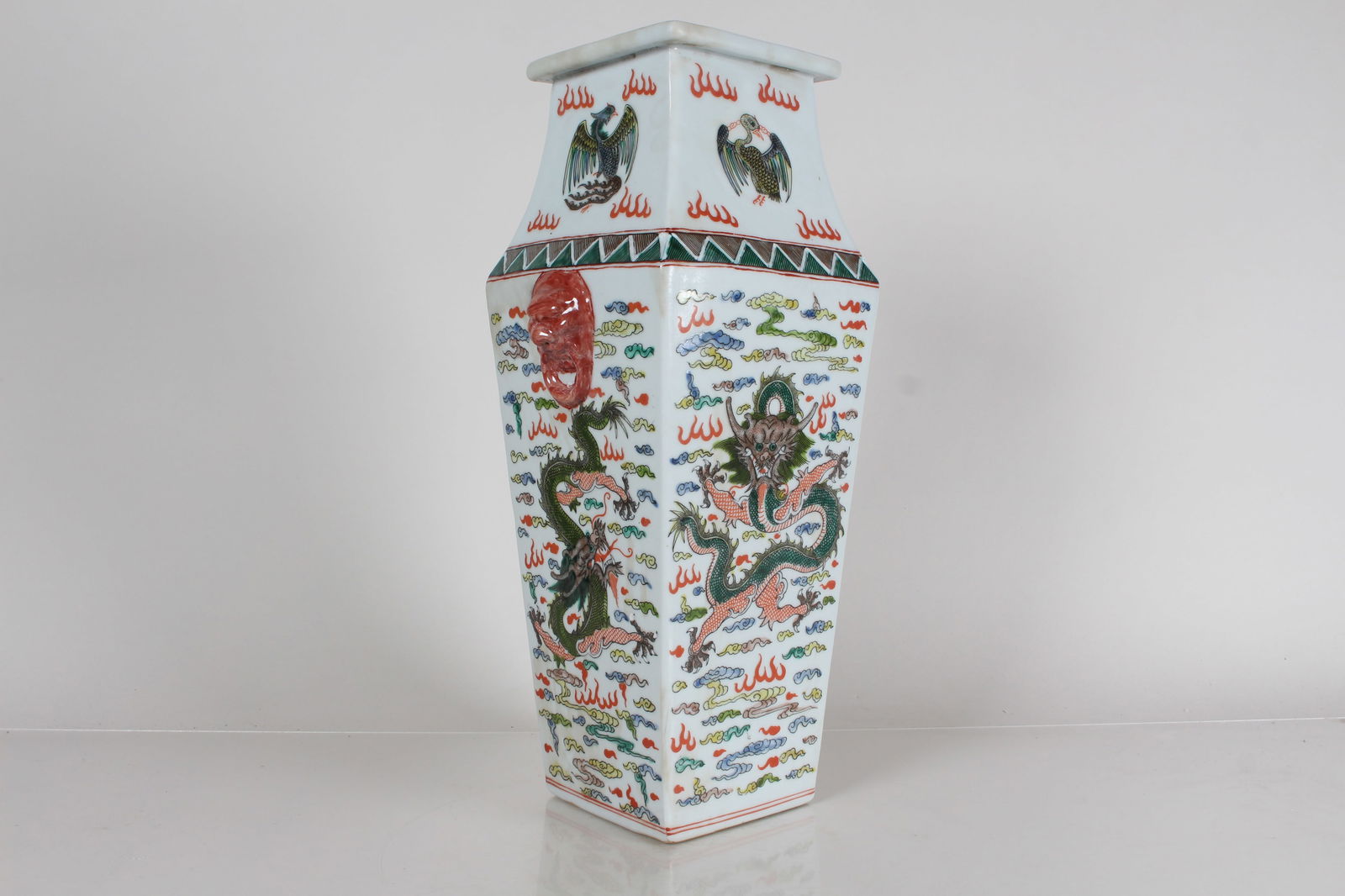 A Chinese Square-based Dragon-decorating Porcelain Fortune Vase: A Chinese Square-based Dragon-decorating Porcelain Fortune Vase . Height: 17 (inch).