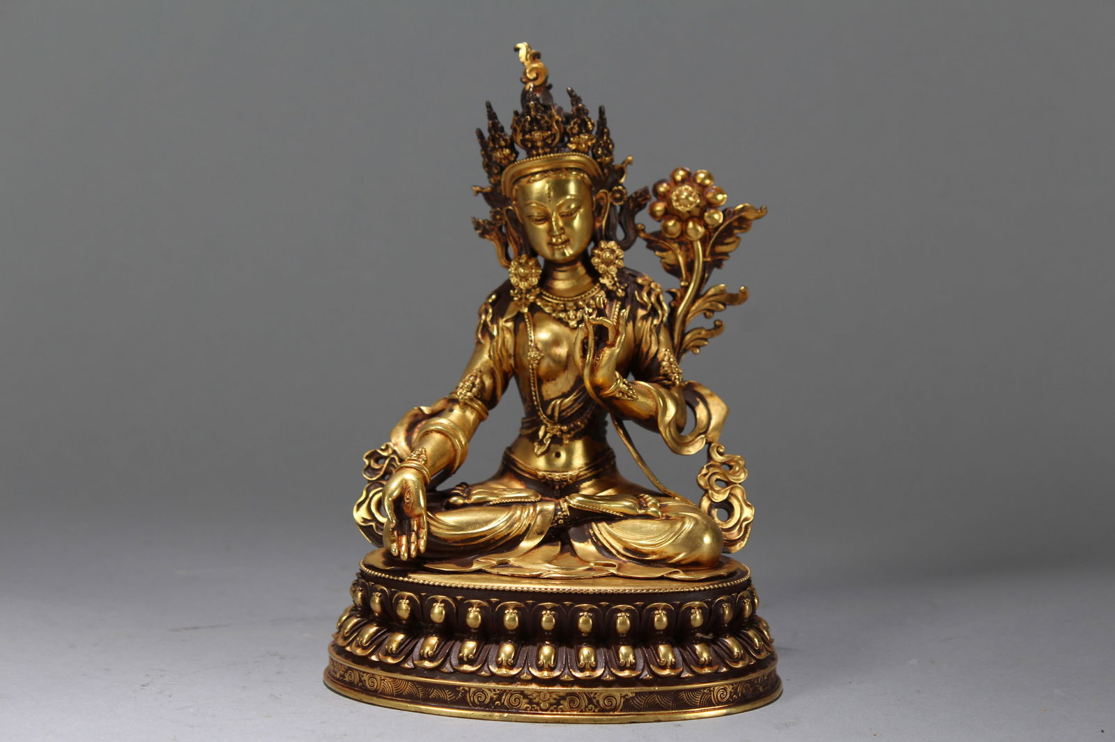 A Chinese Gilt Vividly-detailed Religious Fortune Buddha Statue: A Chinese Gilt Vividly-detailed Religious Fortune Buddha Statue. Height: 6.25 (inch). Width: 4.25 (inch). Length: 3 (inch).