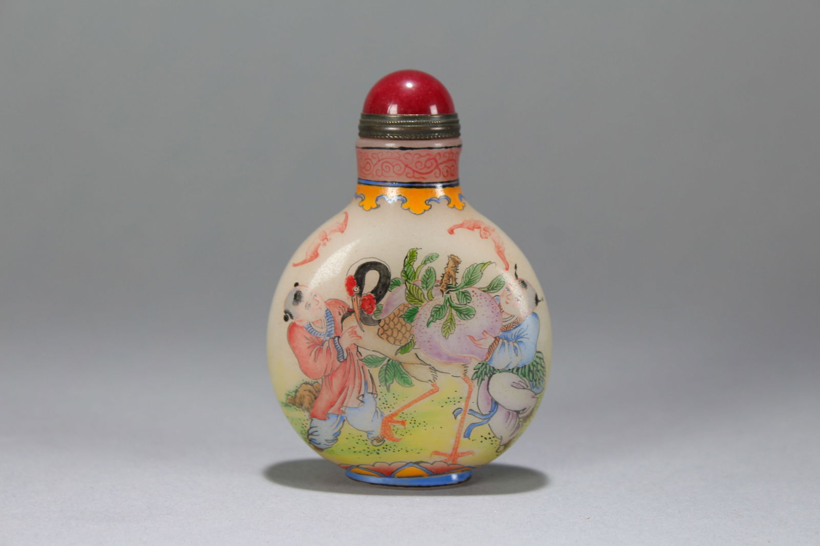 A Chinese Story-telling Joyful-kid Lidded Snuff-bottle (1 of 8)