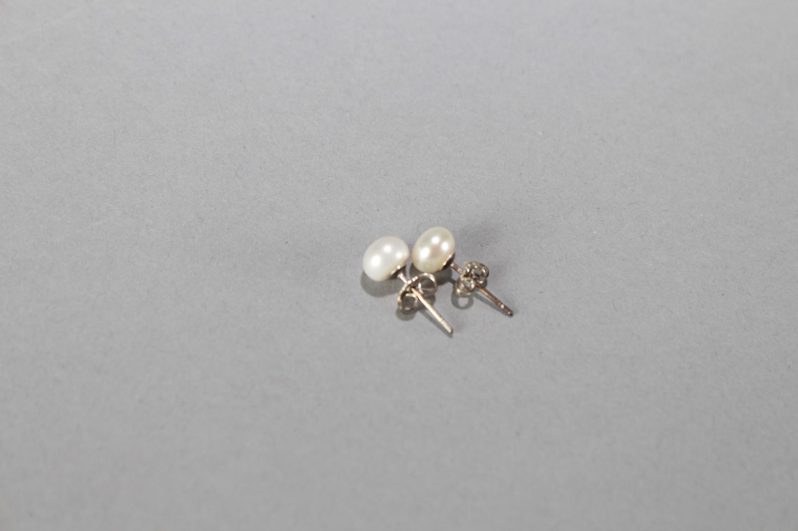 A Pair of Beaded Fortune Earrings: A Pair of Beaded Fortune Earrings.