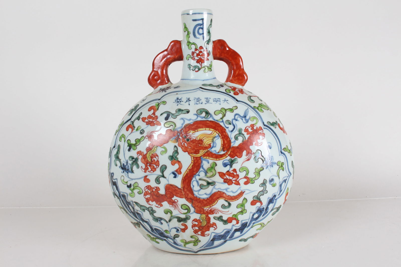 A Chinese Duo-handled Dragon-decorating Porcelain Fortune Vase: A Chinese Duo-handled Dragon-decorating Porcelain Fortune Vase . Height: 13.5 (inch).