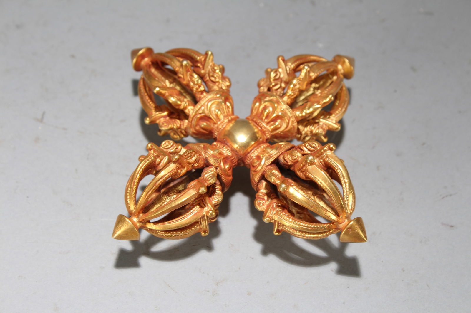 A Chinese Vividly-detailed Gilt Fortune Figure: A Chinese Vividly-detailed Gilt Fortune Figure. Height : 1.5 (inch). Width : 5 (inch). Length : 5 (inch).