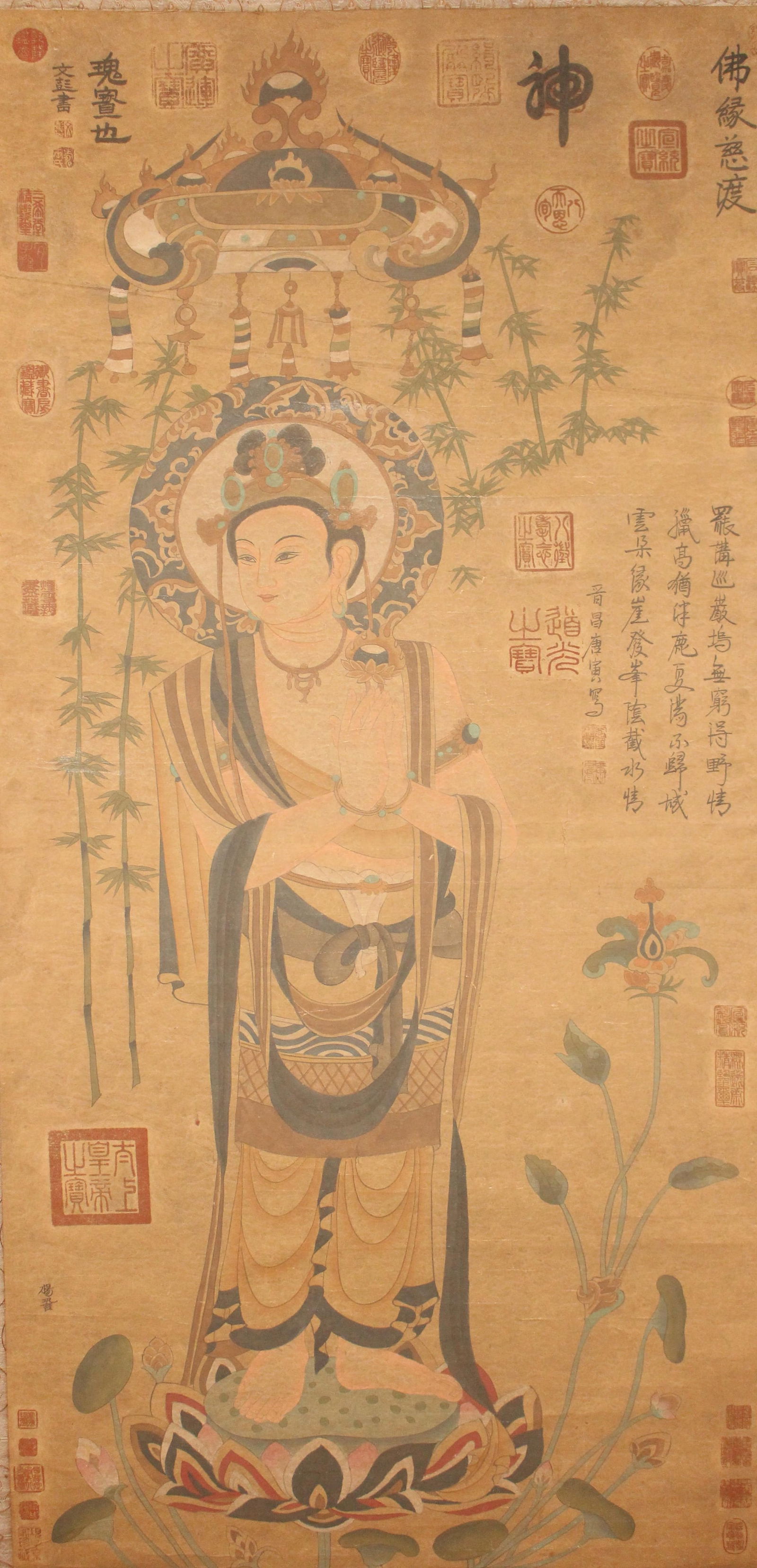 A Chinese Religious Poetry-framing Portrait Fortune Scroll: A Chinese Religious Poetry-framing Portrait Fortune Scroll. Length: 50(inch). Width: 25 (inch).