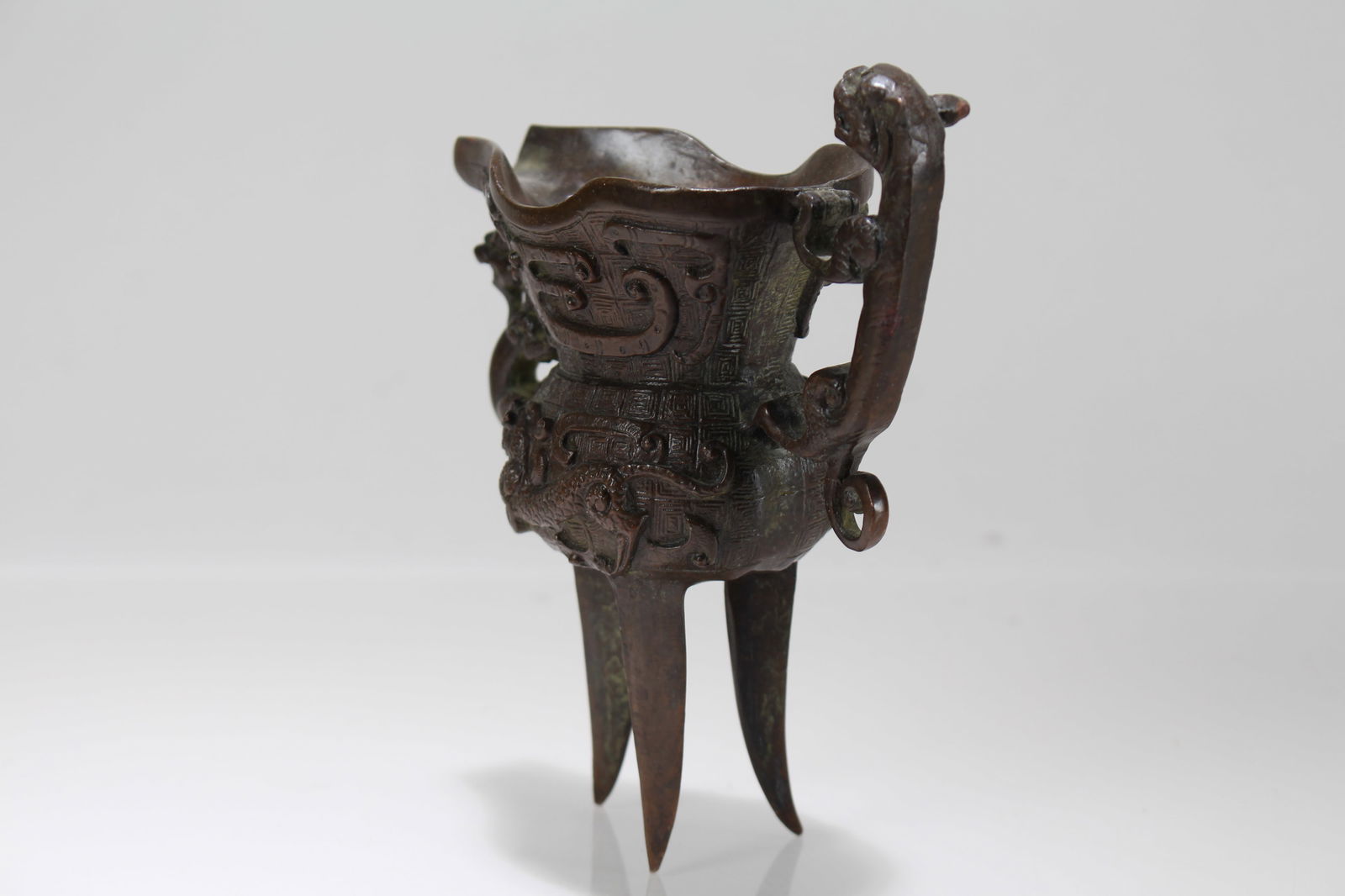 A Chinese Tri-podded Fortune Cup - 3