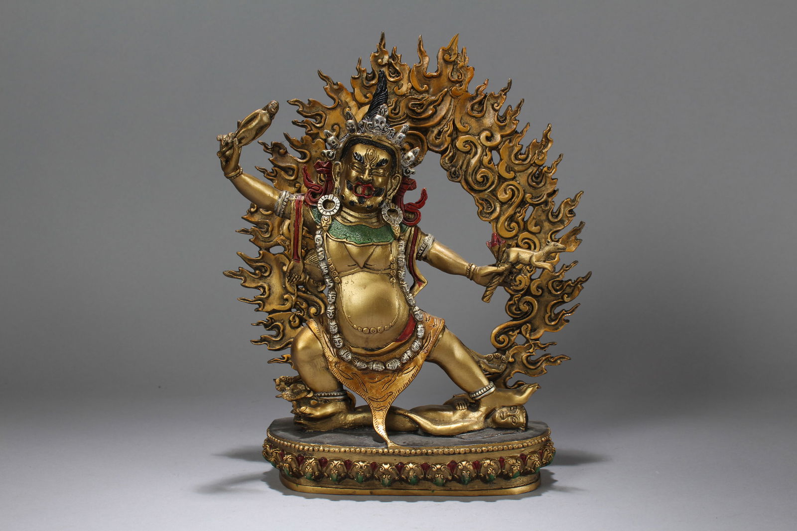 A Chinese Religious Lotus-framing Gilt Fortune Buddha Statue: A Chinese Religious Lotus-framing Gilt Fortune Buddha Statue. Height: 12 (inch). Length: 10 (inch). Width: 2.5 (inch).