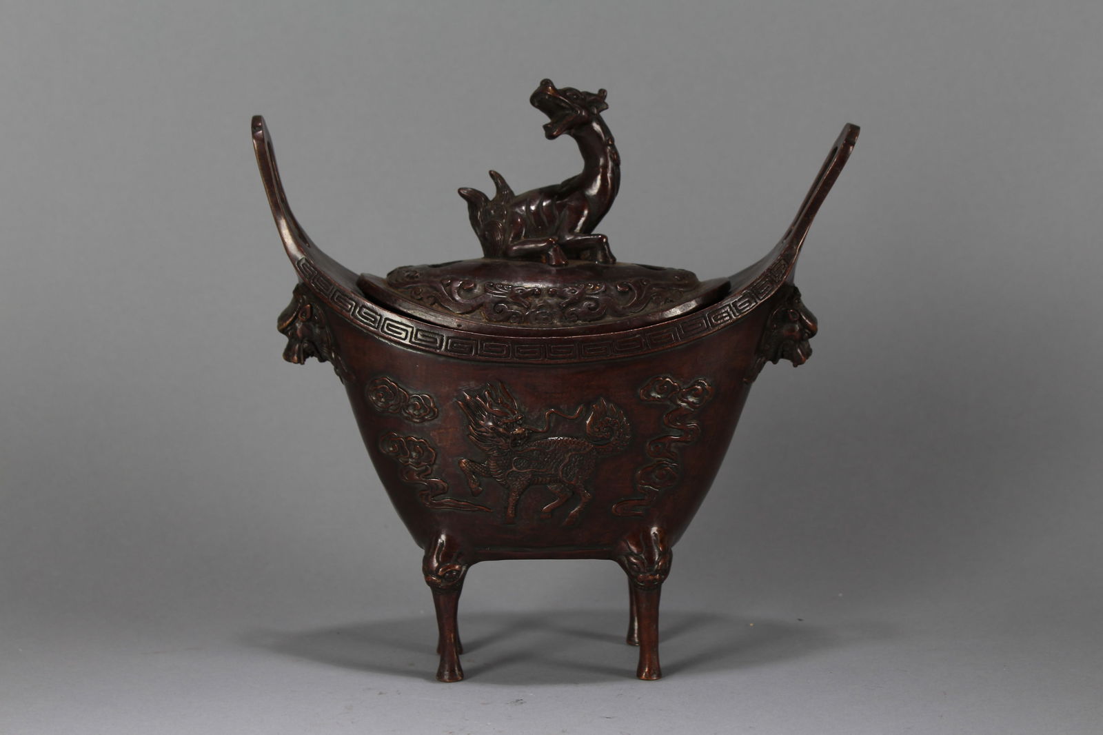 A Chinese Square-based Myth-beast Lidded Fortune Censer: A Chinese Square-based Myth-beast Lidded Fortune Censer. Height : 8.5 (inch). Width : 8.75 (inch). Length : 3.25 (inch).
