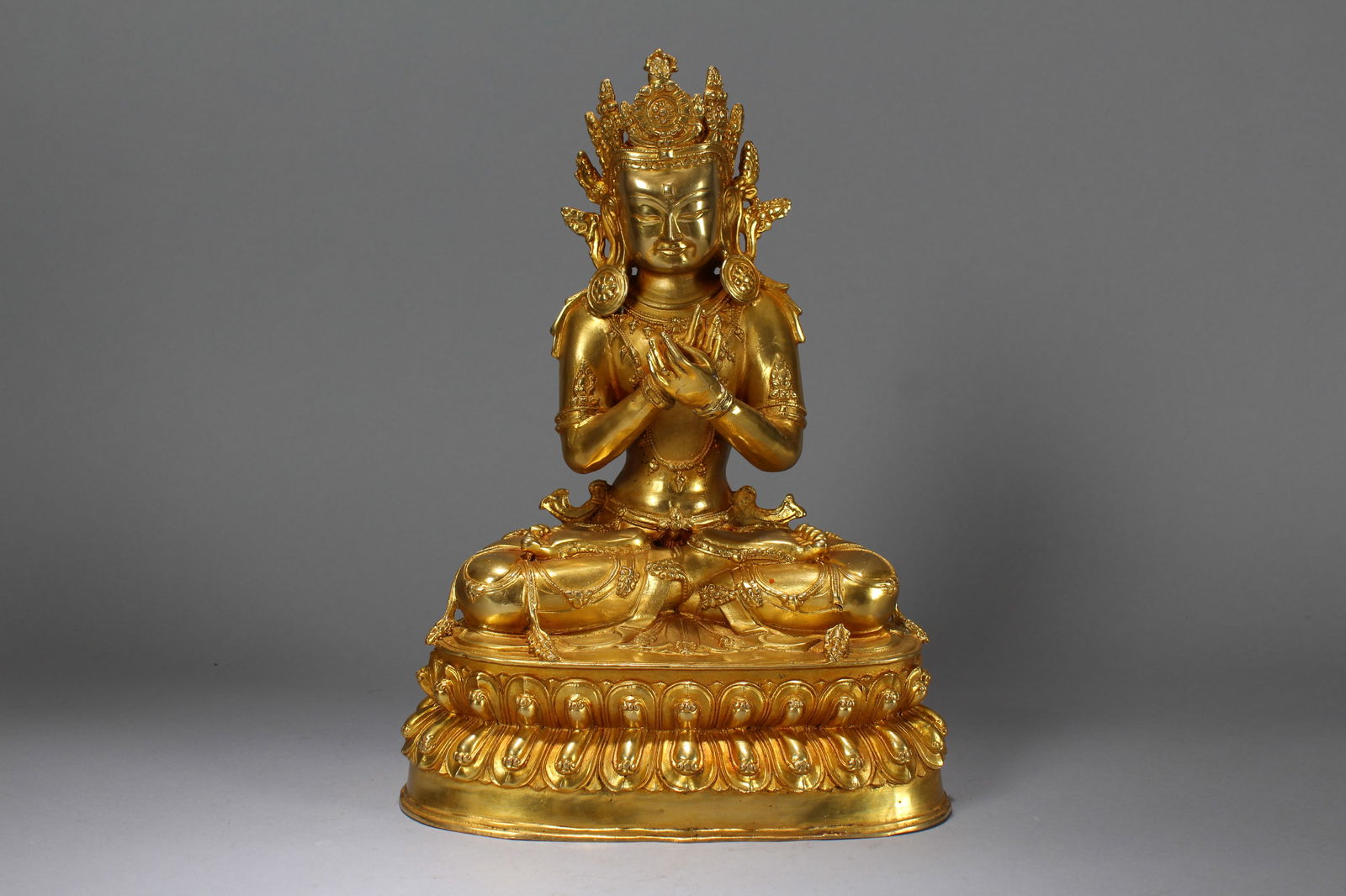 A Chinese Vividly-detailed Religious Gilt Fortune Buddha Statue: A Chinese Vividly-detailed Religious Gilt Fortune Buddha Statue. Height: 12.75 (inch). Length: 9 (inch). Width: 6 (inch).