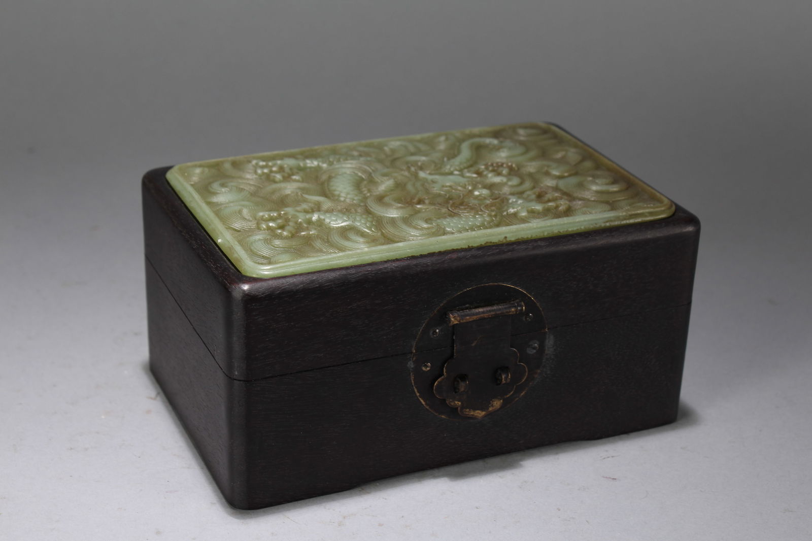 A Chinese Lidded Dragon-decorating Jade-inserted Fortune Box: A Chinese Lidded Dragon-decorating Jade-inserted Fortune Box. Height : 3.2 (inch). Width : 6.6 (inch). Length : 4.25 (inch).