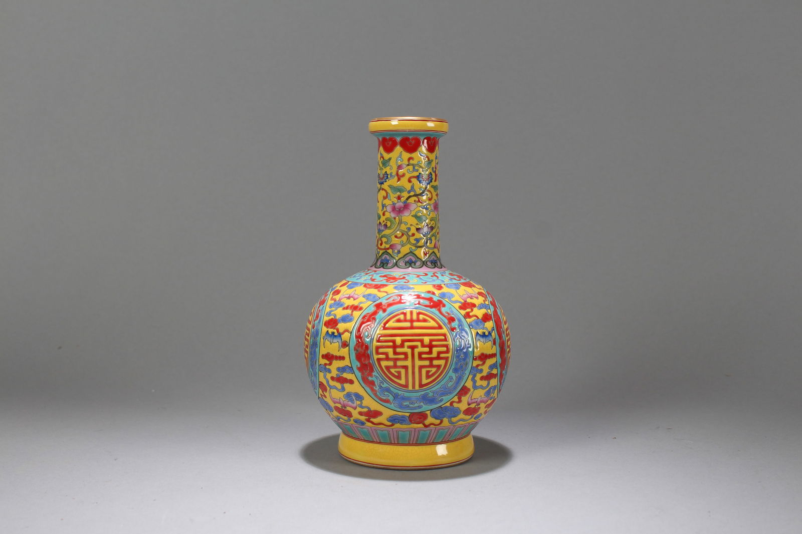 A Chinese Bat-framing Porcelain Fortune Vase: A Chinese Bat-framing Porcelain Fortune Vase. Height: 7.25 (inch). Opening Diameter: 4 (inch)