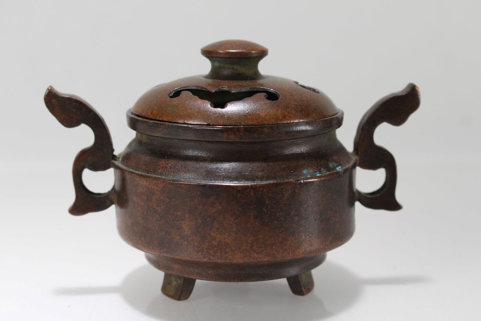 A Chinese Duo-handled Tri-podded Fortune Censer: A Chinese Duo-handled Tri-podded Fortune Censer . Height: 3 (inch). Length: 4.5 (inch).