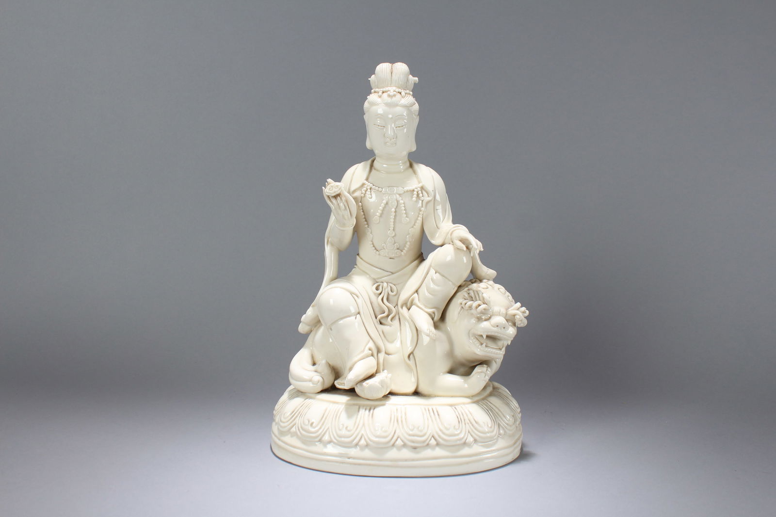 A Chinese Religious Fortune De Blac Fortune Guanyin Statue: A Chinese Religious Fortune De Blac Fortune Guanyin Statue. Height: 13.75 (inch). Length: 8.5 (inch). Width: 6 (inch).