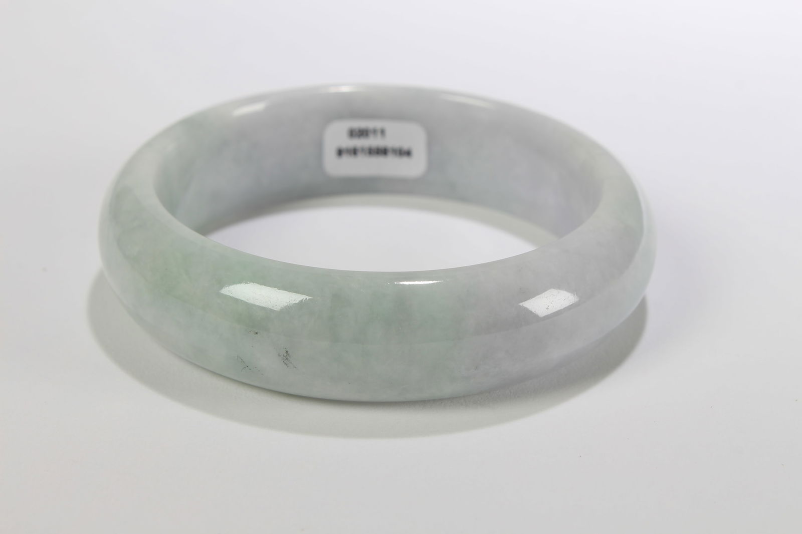 A Chinese Bangle Display: A Chinese Bangle Display . Opening Diameter: 3 (inch).