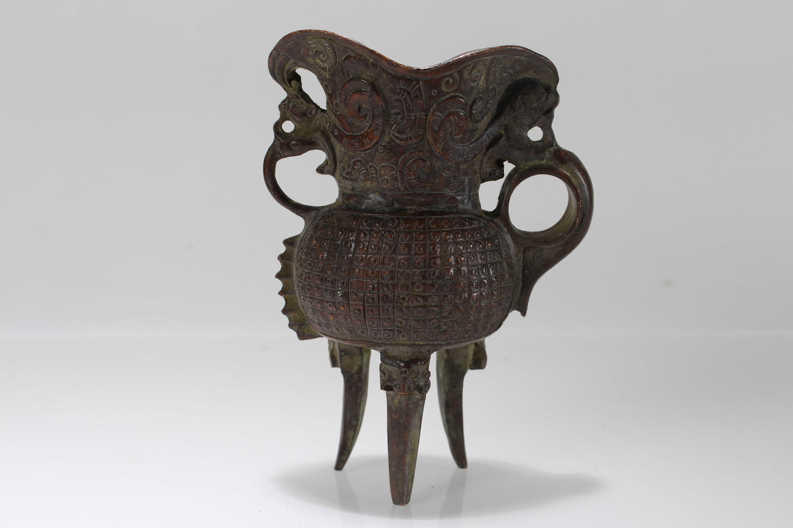 A Chinese Tri-podded Fortune Cup - 2