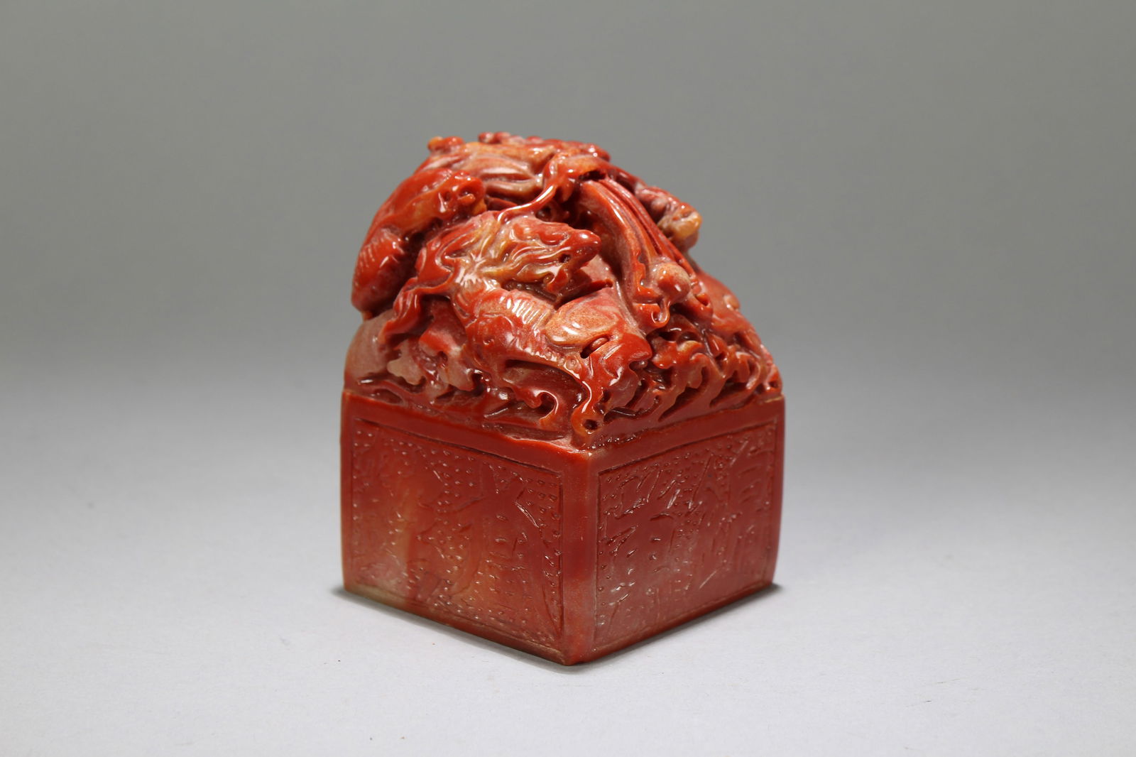 A Chinese Square-based Fortune Soapstone Seal: A Chinese Square-based Fortune Soapstone Seal. Height: 4.25 (inch). Length: 3 (inch). Width: 3 (inch).