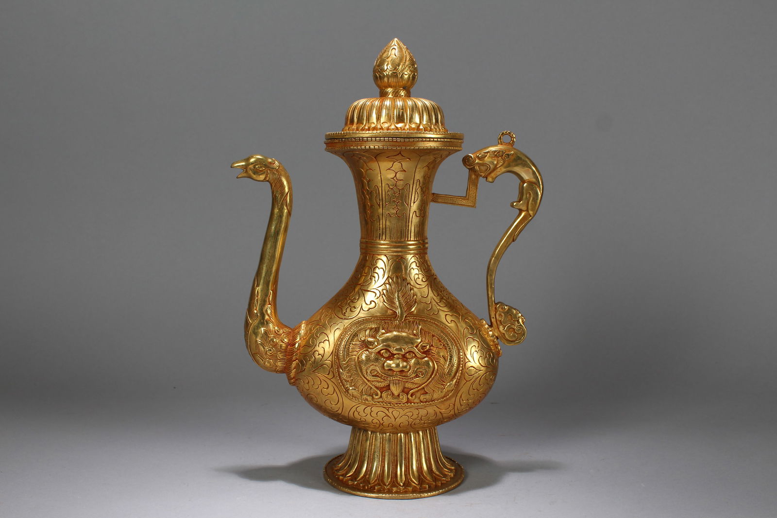 A Chinese Gilt Vividly-detailed Myth-beast Fortune Lidder Ewer: A Chinese Gilt Vividly-detailed Myth-beast Fortune Lidder Ewer. Height: 12.75 (inch). Length: 9 (inch). Width: 4.25 (inch).
