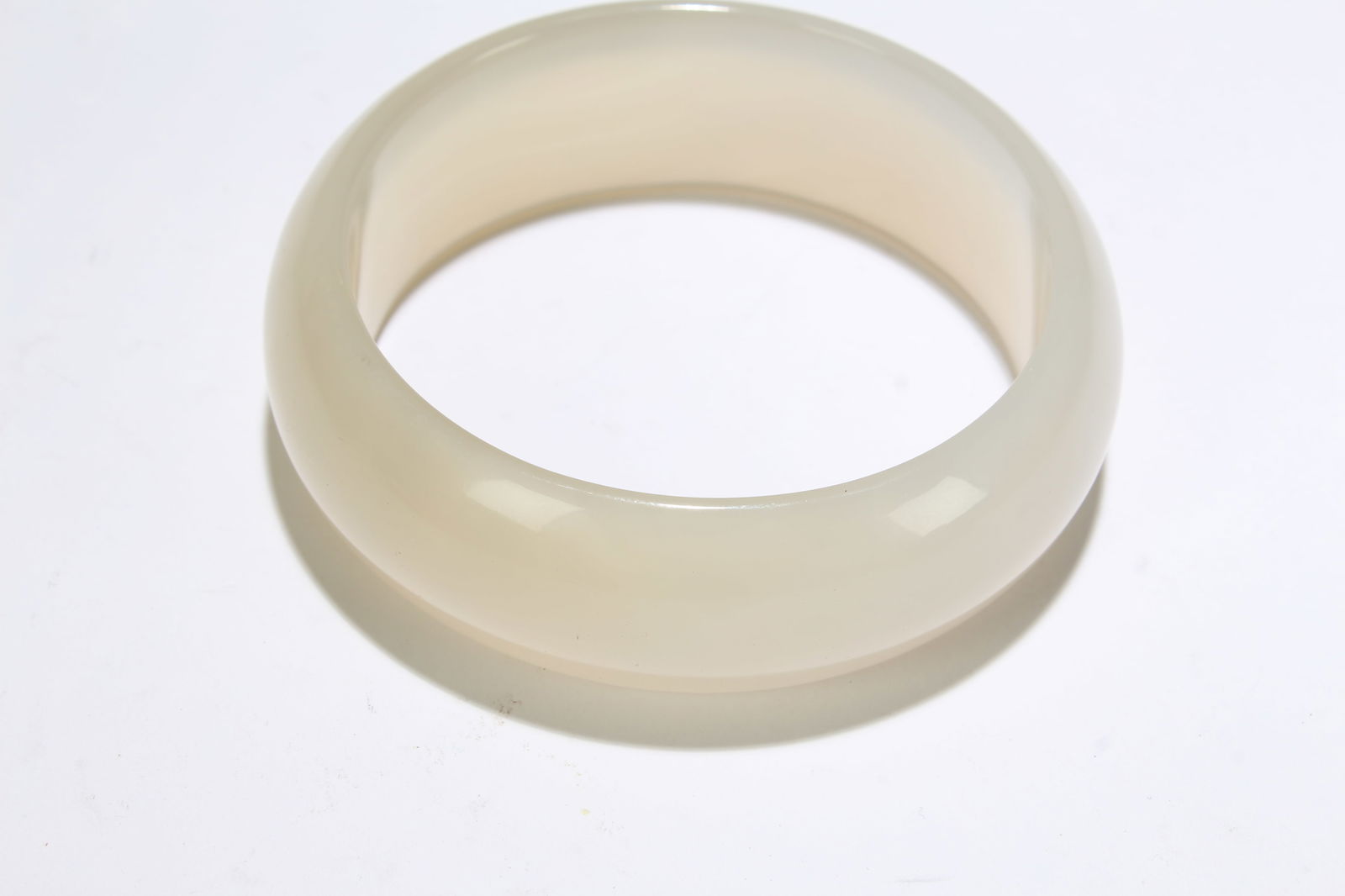 A Chinese Bangle Display: A Chinese Bangle Display . Length: 9 (inch). Opening Diameter: 2 (inch).