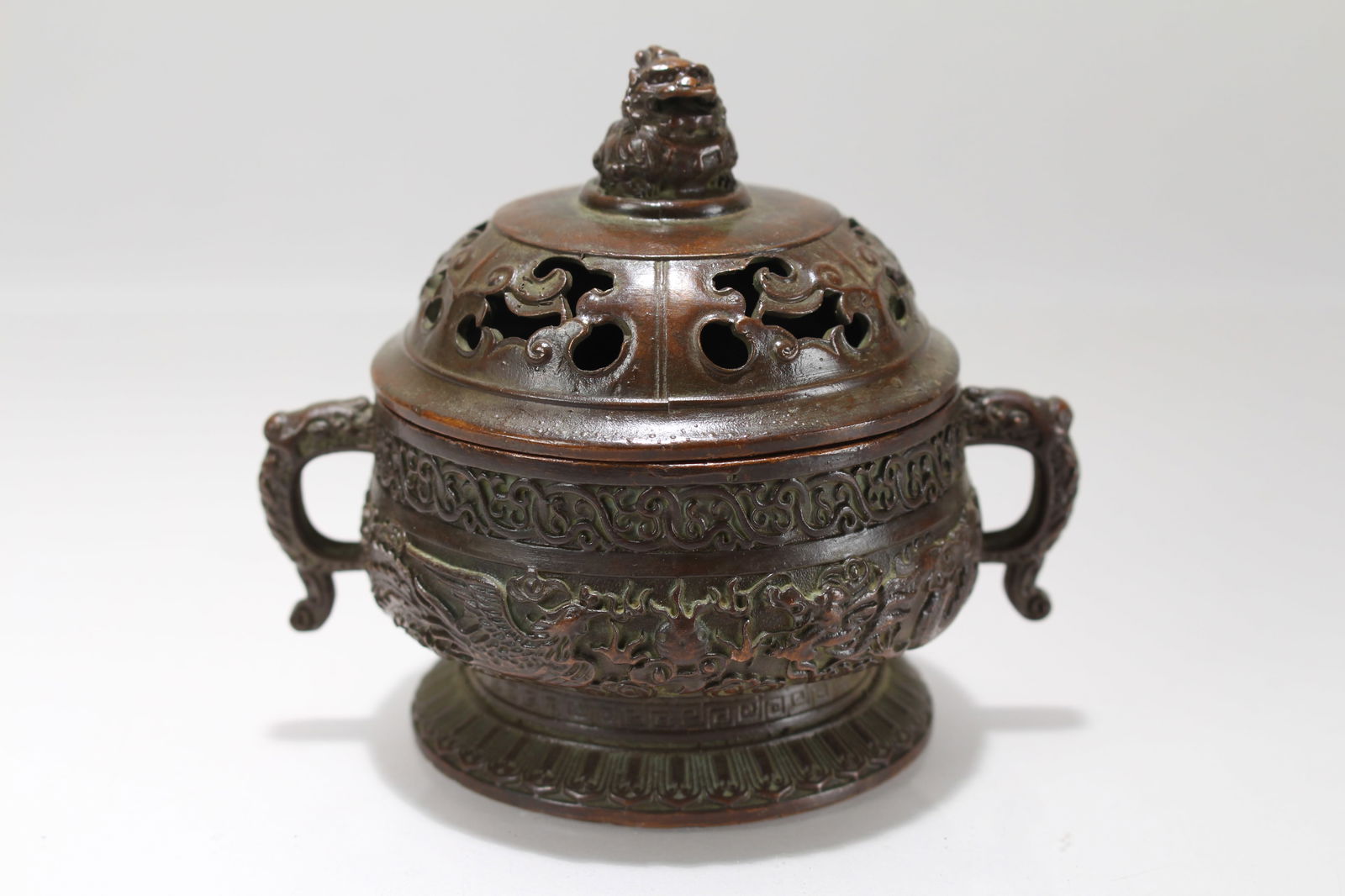 A Chinese Duo-handled Fortune Censer: A Chinese Duo-handled Fortune Censer . Height: 3.5 (inch). Length: 4.5 (inch).