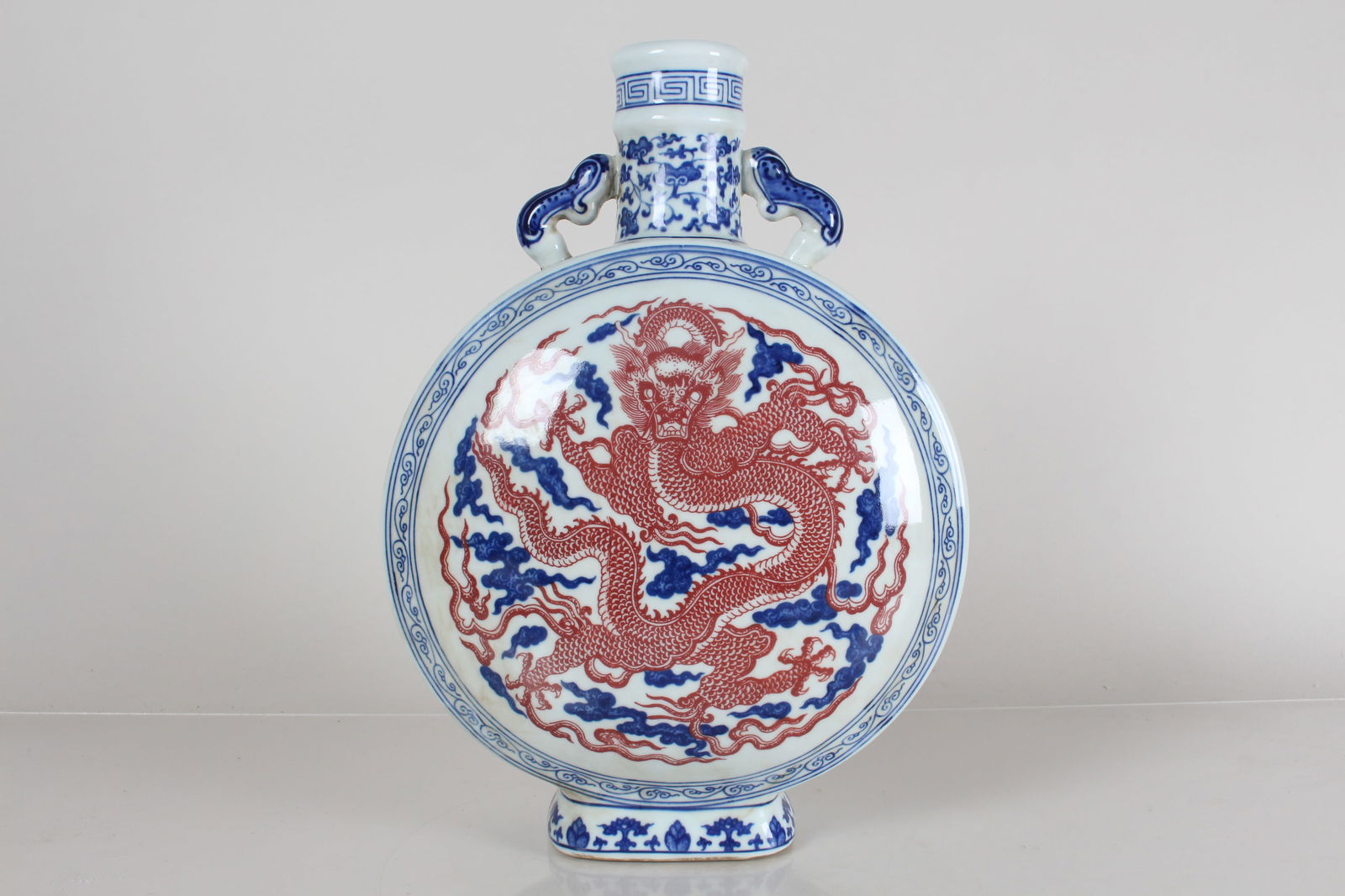 A Chinese Duo-handled Dragon-decorating Porcelain Fortune Vase: A Chinese Duo-handled Dragon-decorating Porcelain Fortune Vase . Height: 14 (inch).