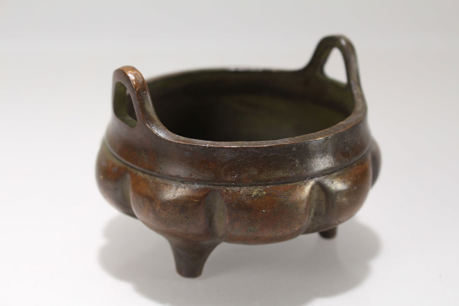 A Chinese Tri-podded Fortune Censer: A Chinese Tri-podded Fortune Censer. Height: 2.25 (inch). Opening Diamater: 3 (inch).