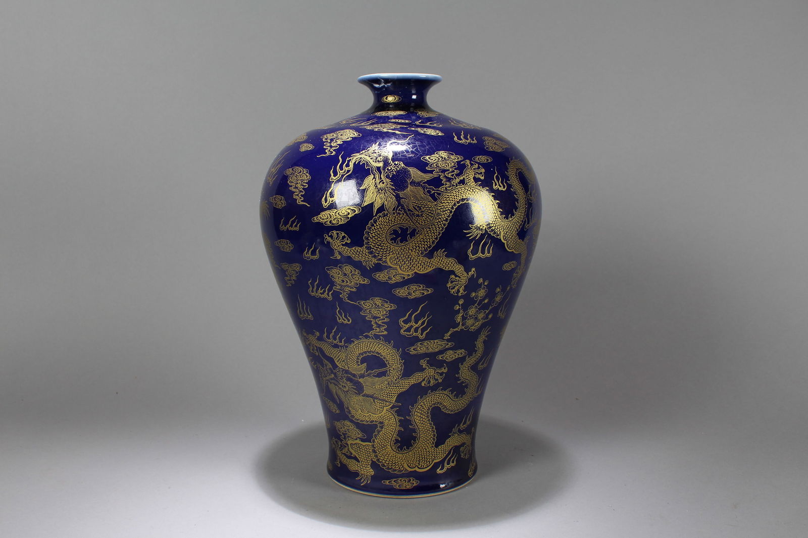A Chinese Dragon-decorating Blue-coding Porcelain Vase: A Chinese Dragon-decorating Blue-coding Porcelain Vase. Height: 14 (inch). Opening Diameter: 8 (inch)