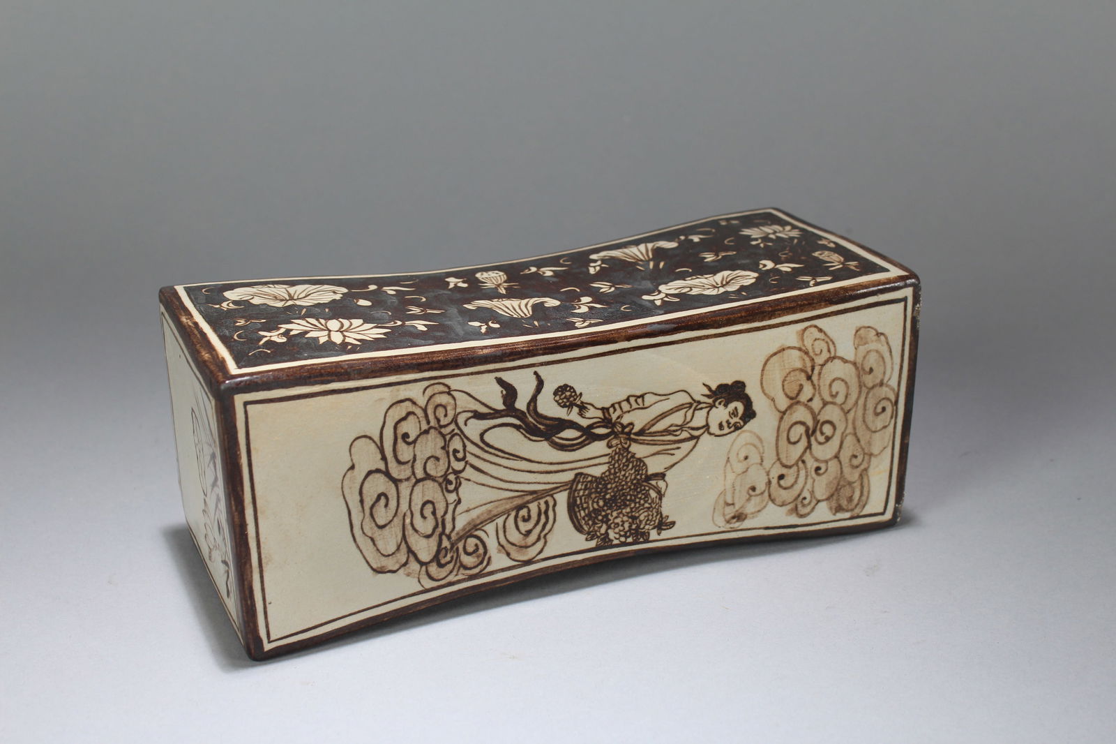 A Chinese Religious Porcelain Fortune Pillow Stand (1 of 6)