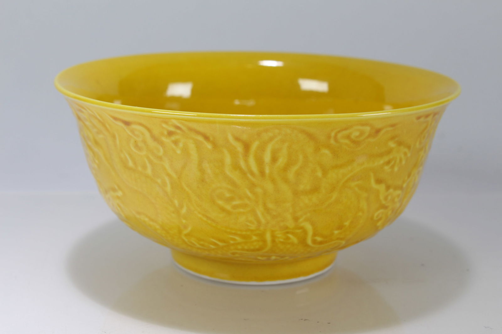 A Chinese Ancient-framing Yellow-coding Porcelain Fortune Bowl: A Chinese Ancient-framing Yellow-coding Porcelain Fortune Bowl. Height: 2.75 (inch). Opening Diameter: 6 (inch).