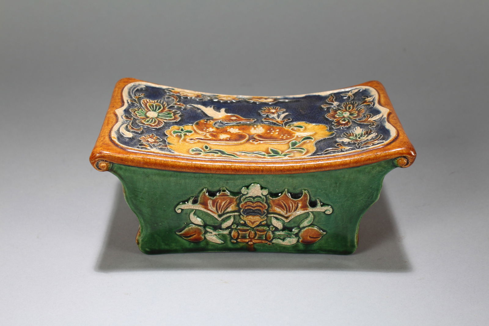 A Chinese Religious Porcelain Fortune Pillow Stand (1 of 6)