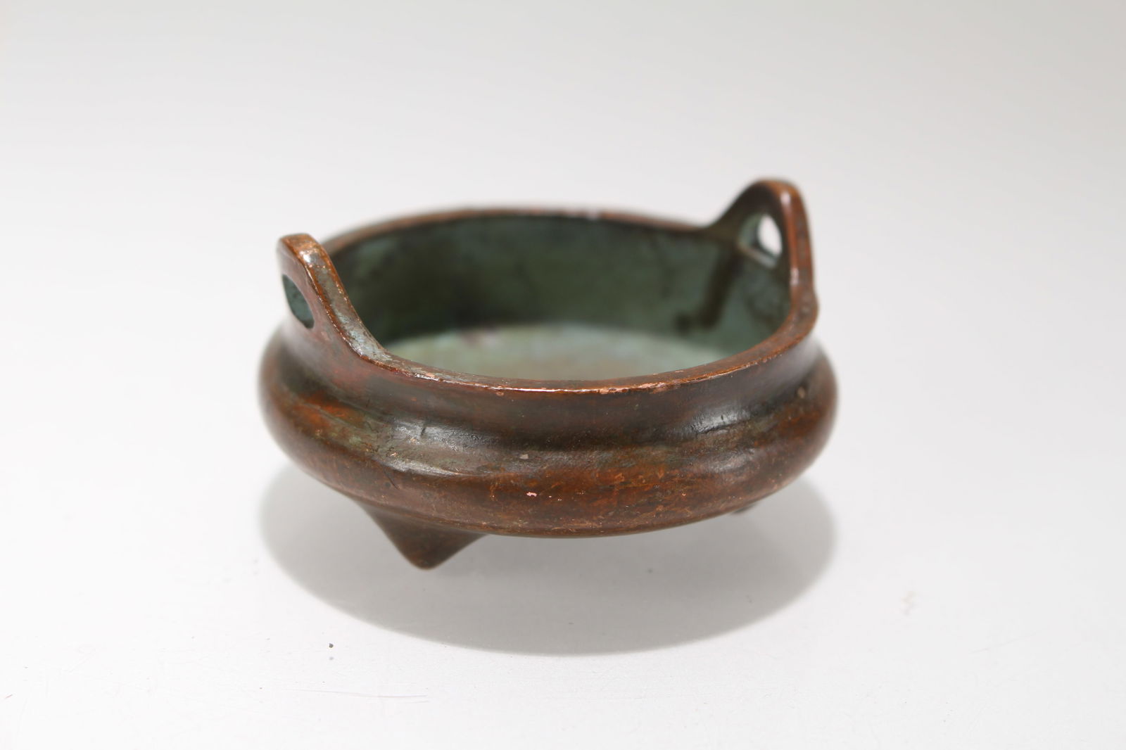 A Chinese Tri-podded Fortune Censer: A Chinese Tri-podded Fortune Censer. Height: 1.25 (inch). Opening Diamater: 2 (inch).