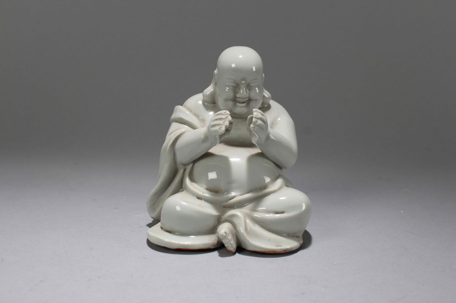 A Chinese De Blac Happy-buddha Porcelain Fortune Statue (1 of 5)