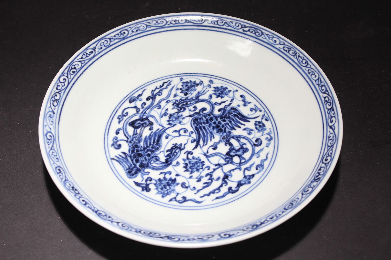 A Chinese Phoenix-fortune Anicent-framing Porcelain Fortune Plate: A Chinese Phoenix-fortune Anicent-framing Porcelain Fortune Plate. Height: 1.25 (inch). Opening Diameter: 8.25 (inch)