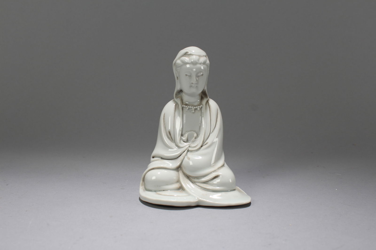 A Chinese De Blac Porcelain Fortune Guanyin Fortune Statue (1 of 5)