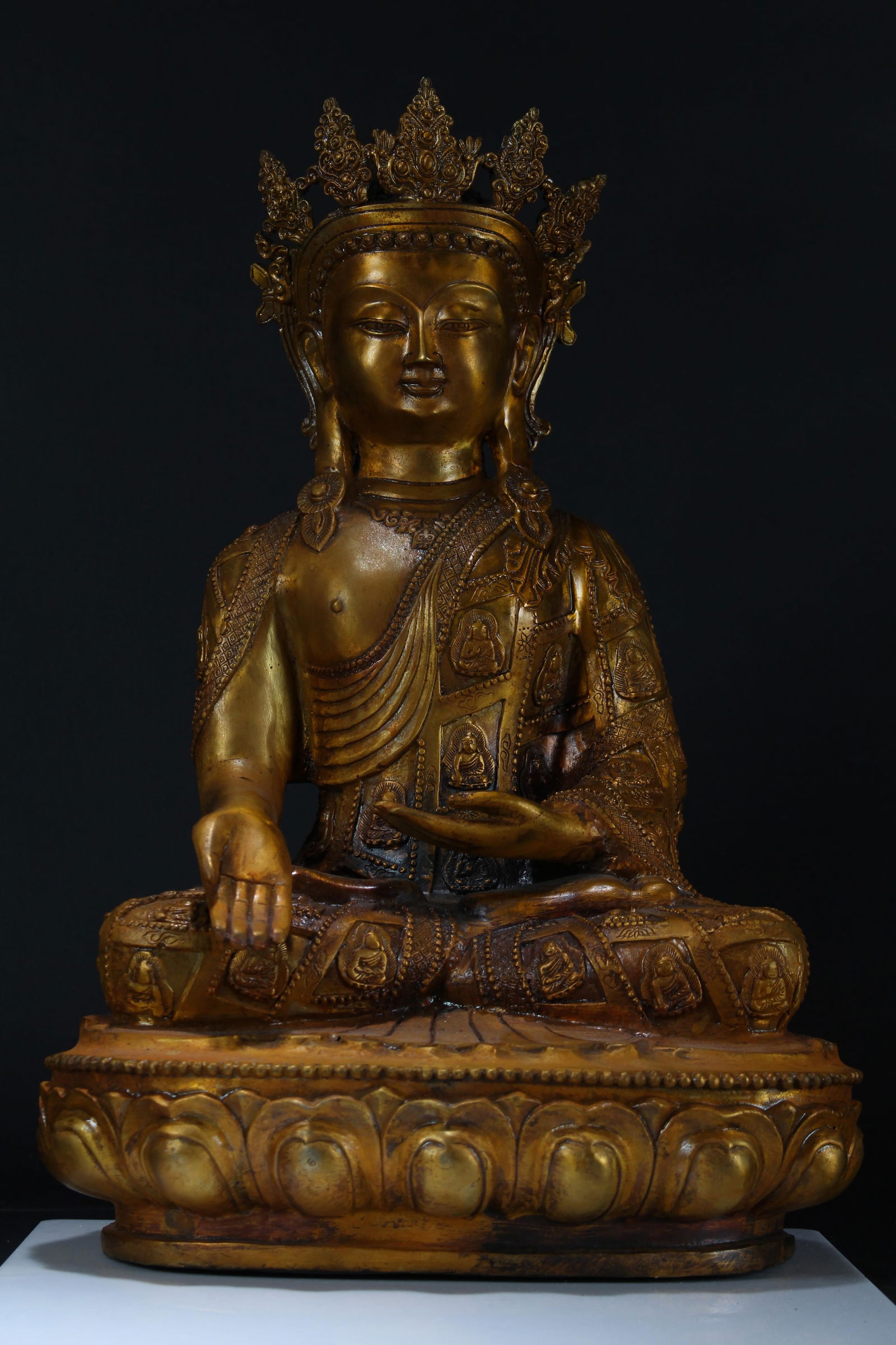 A Chinese Massive Gilt Religious Buddha Statue: A Chinese Massive Gilt Religious Buddha Statue. Height: 18 (inch). Length: 11 (inch). Width: 7 (inch).