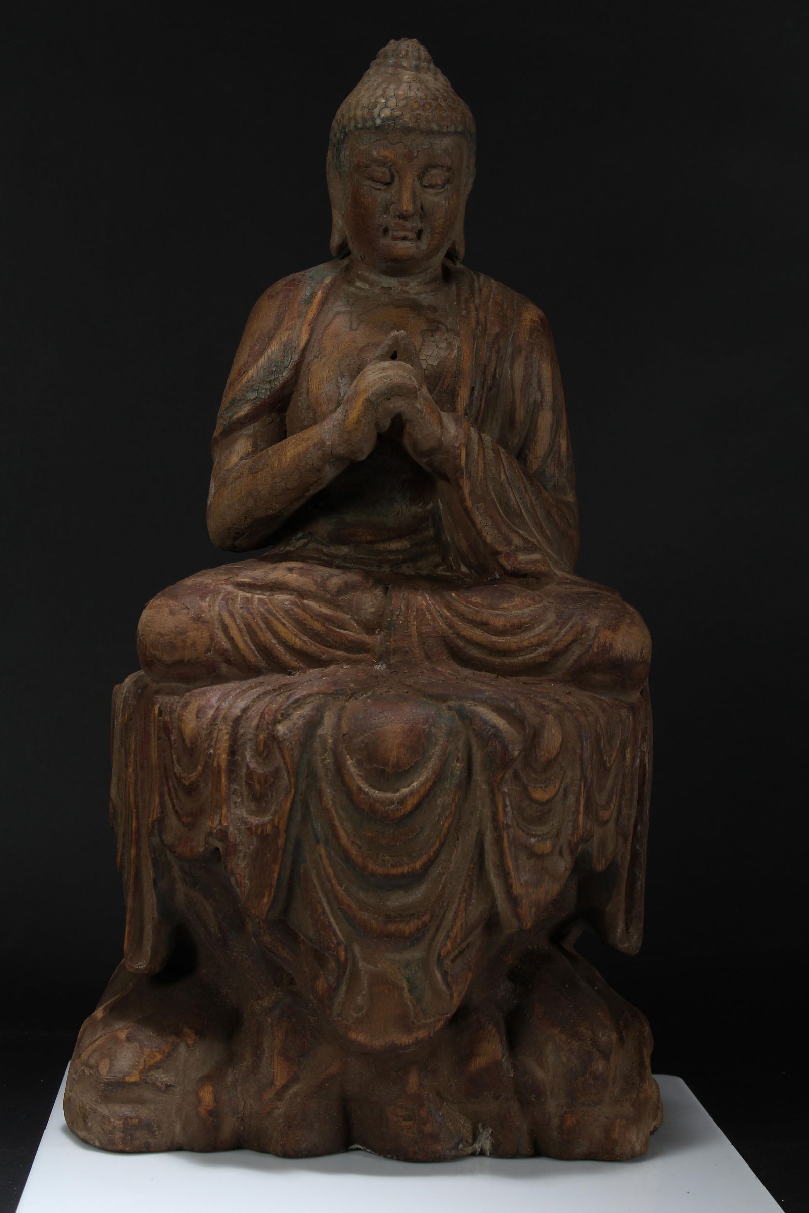 A Chinese Peaceful-posing Religious Buddha Statue: A Chinese Peaceful-posing Religious Buddha Statue. Height: 19 (inch). Length: 10(inch). Width: 7 (inch).