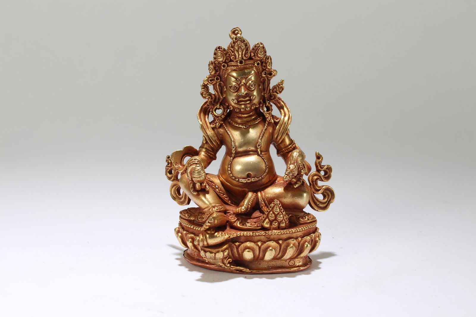 A Chinese Religious Fortune Gilt Buddha Statue: A Chinese Religious Fortune Gilt Buddha Statue. Height: 4.5 (inch). Length: 3.25 (inch).