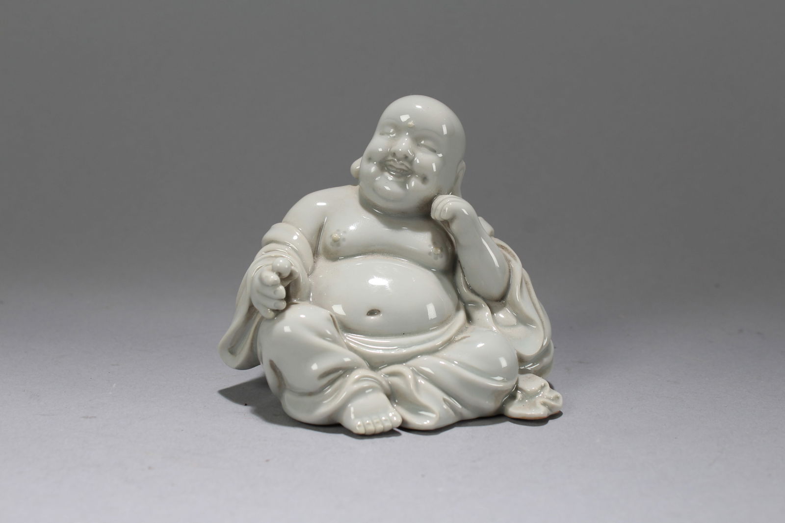 A Chinese De Blac Happy-buddha Porcelain Fortune Statue (1 of 5)
