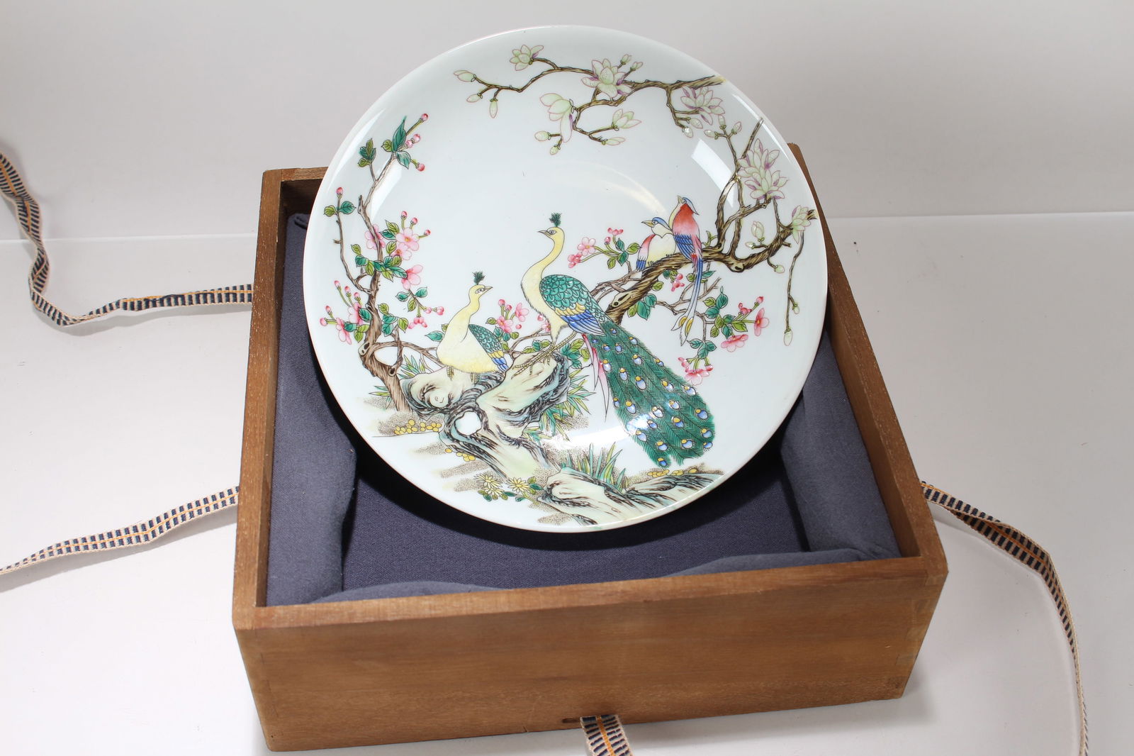 A Chinese Wooden-boxed Porcelain Fortune Plate: A Chinese Wooden-boxed Porcelain Fortune Plate. Height: 1.75 (inch). Opening Diameter: 8.25 (inch)