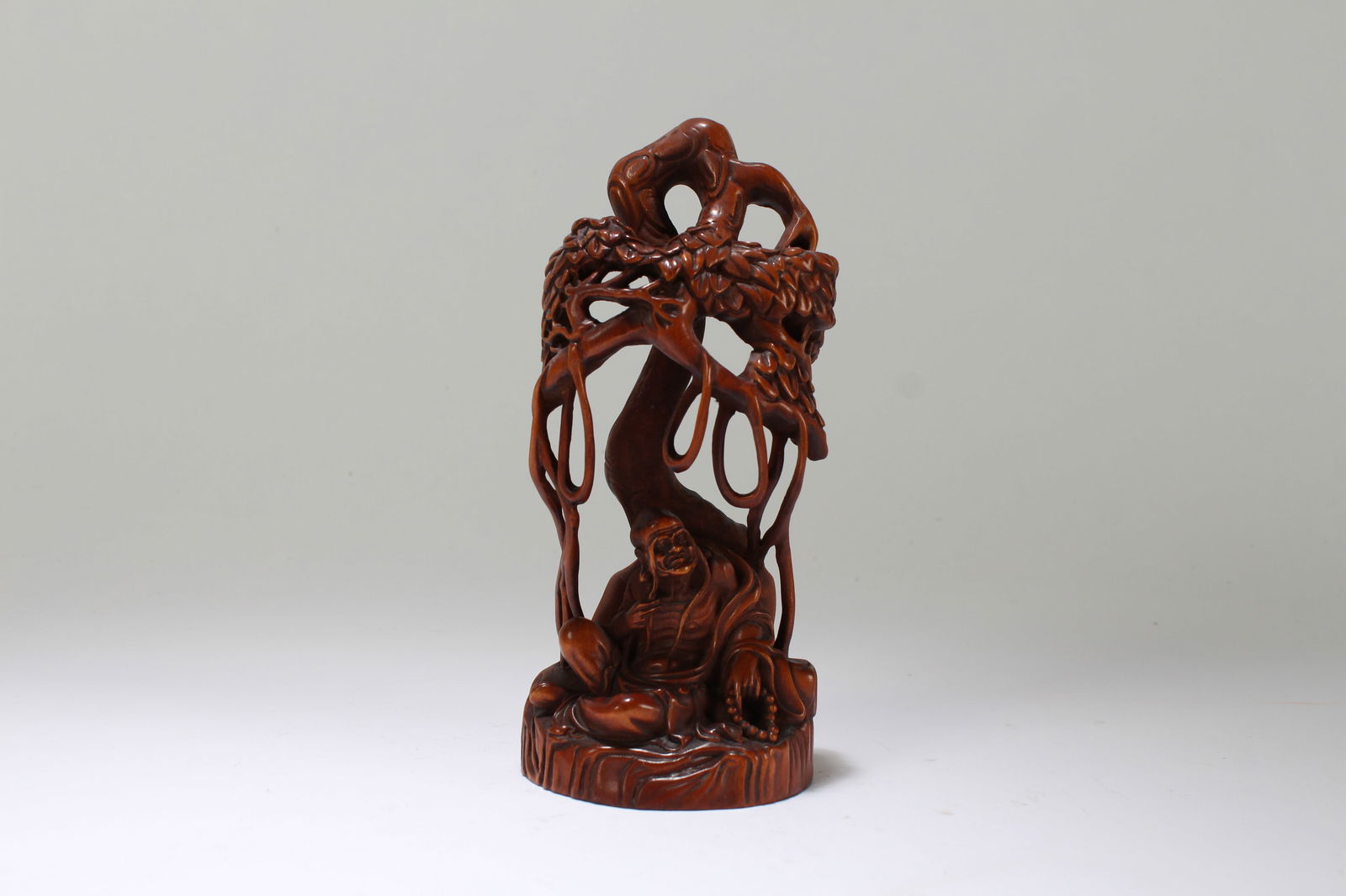 A Chinese Wooden Story-telling Buddha Statue: A Chinese Wooden Story-telling Buddha Statue. Height: 6.25 (inch). Opening Diameter: 3 (inch).