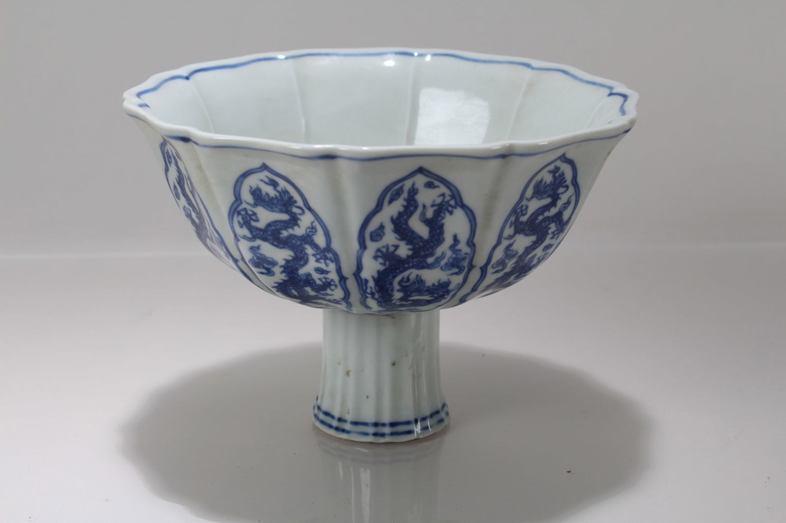 A Chinese Blue and White Porcelain Dragon-decorating Tall-end Cup (1 of 3)