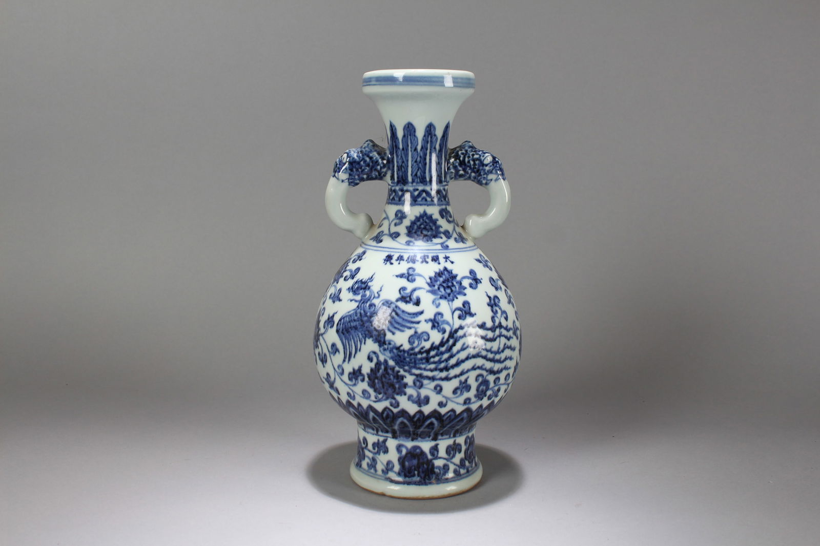 A Chinese Duo-handling Blue and White Phoenix-fortune Porcelain Vase: A Chinese Duo-handling Blue and White Phoenix-fortune Porcelain Vase. Height: 12.5 (inch). Width: 6 (inch).