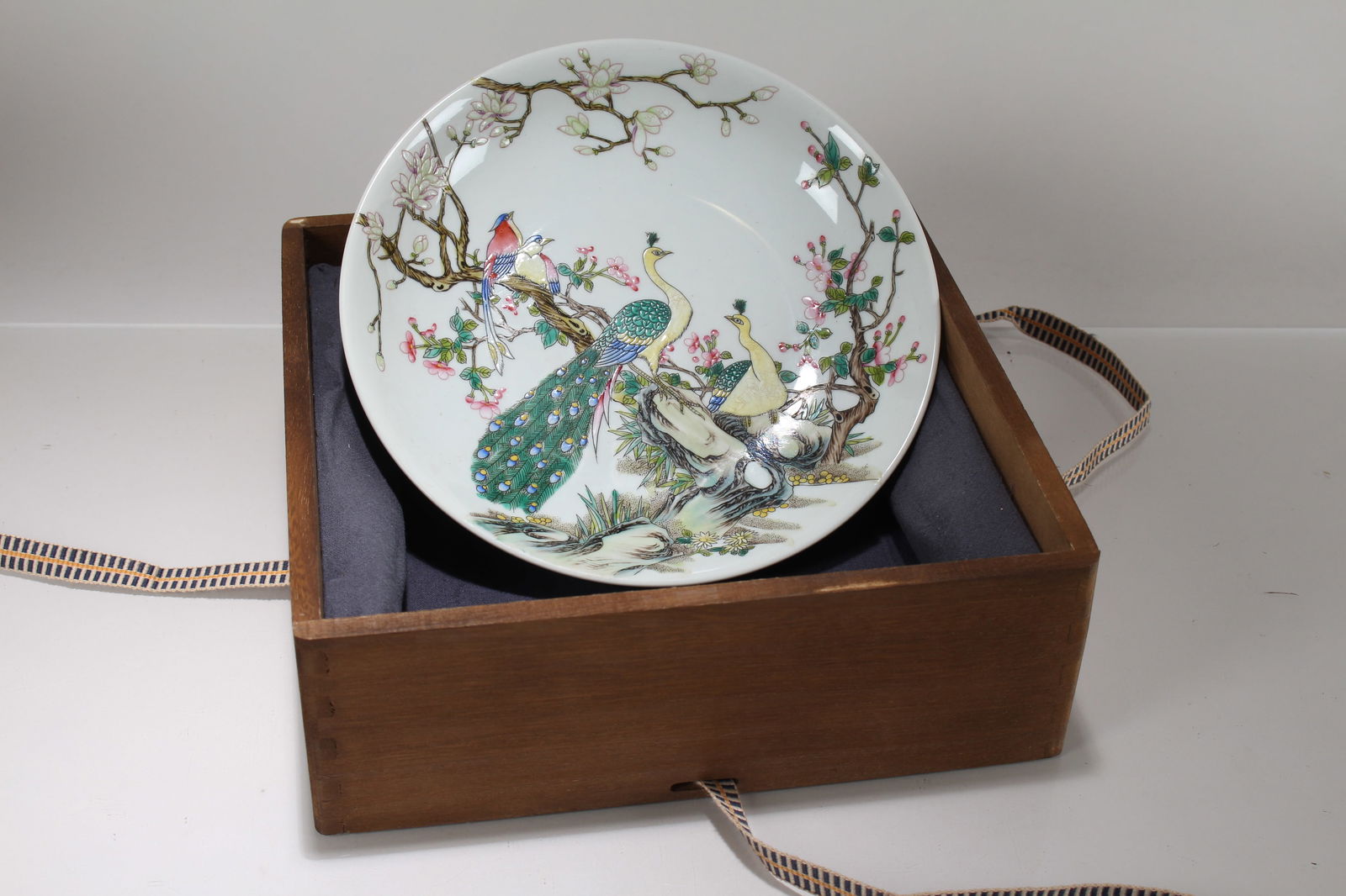 A Chinese Wooden-boxed Porcelain Fortune Plate: A Chinese Wooden-boxed Porcelain Fortune Plate. Height: 1.75 (inch). Opening Diameter: 8.25 (inch)