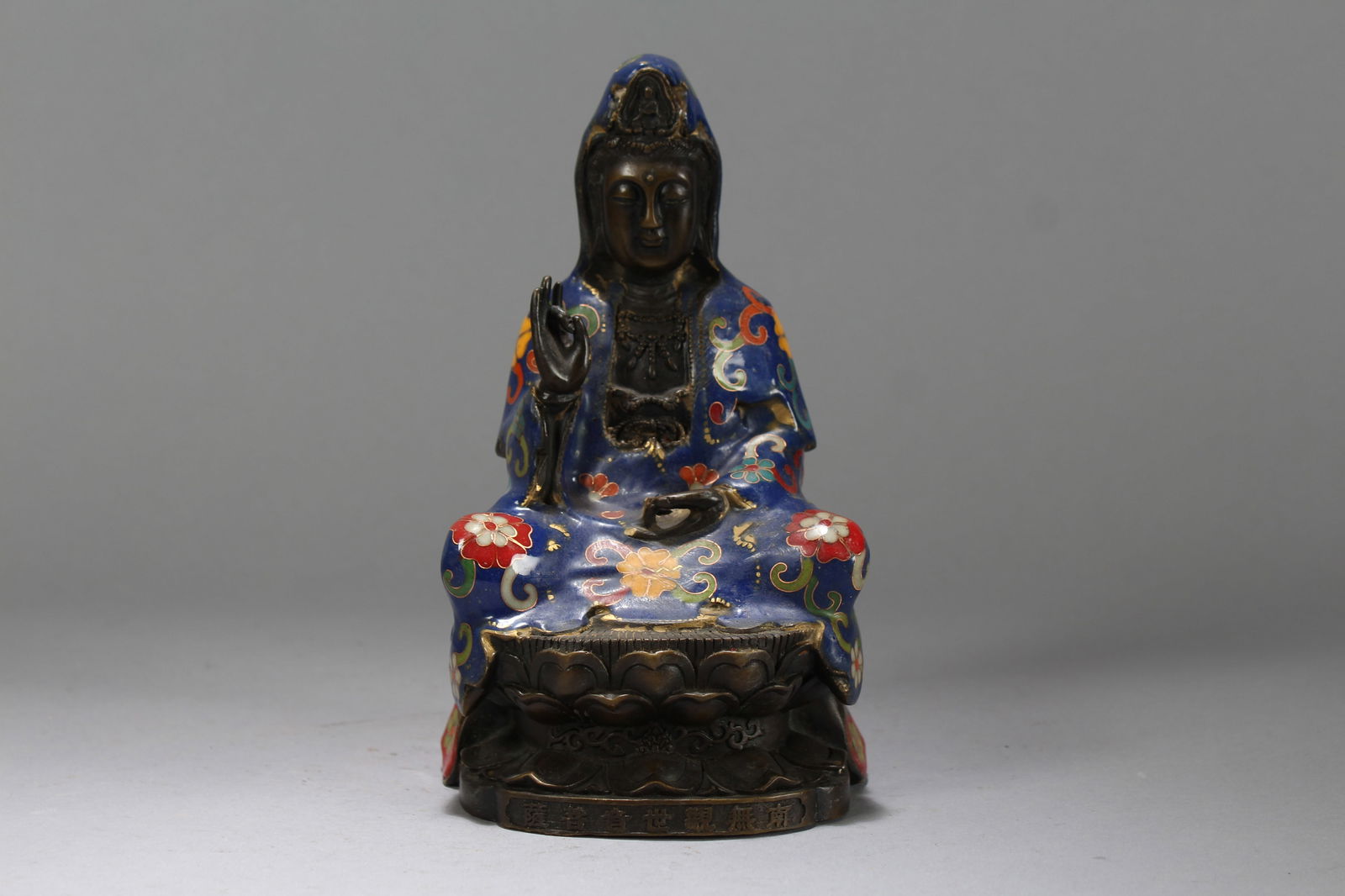 A Chinese Cloisonne Bat-framing Religious Fortune Buddha Statue: A Chinese Cloisonne Bat-framing Religious Fortune Buddha Statue. Height: 7.75 (inch). Length: 4.25 (inch). Width: 3.5 (inch).